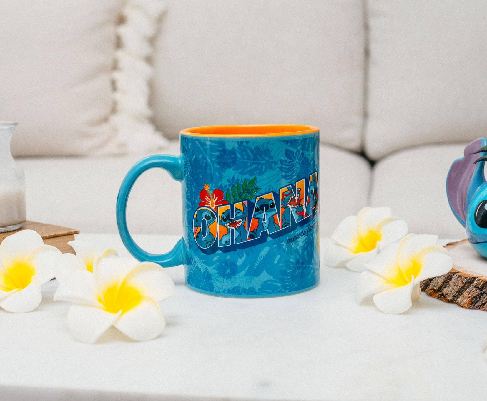 The text on the mug reads: "OCEANIA"