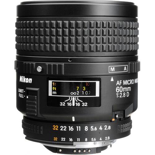 Nikon  
AF MICRO NIKKOR  
60mm 1:2.8 D  

LIMIT- FULL-  
1: ft m  
10 7 3 002 2 1 0.7 32 16 16 32  
M A  

32 22 16 11 8 5.6 4 2.8  
32 22 16 11 8 5.6 4 2.8