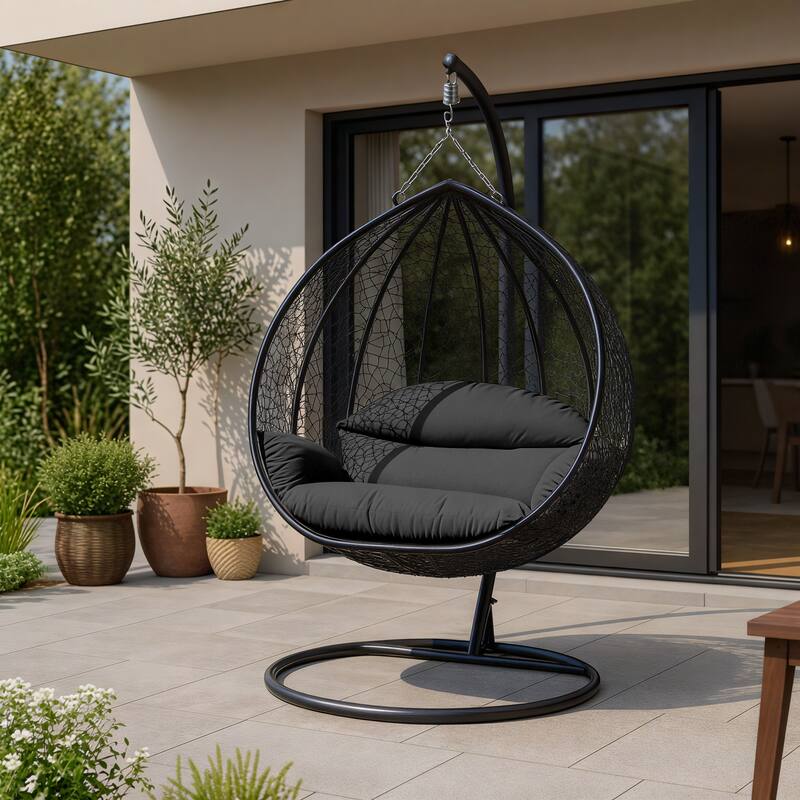 Angle. LeisureMod - Recluse Modern Wicker Teardrop Hanging Egg Chair with Stand - Outdoor Indoor Swing Chair & Cushion - Black.