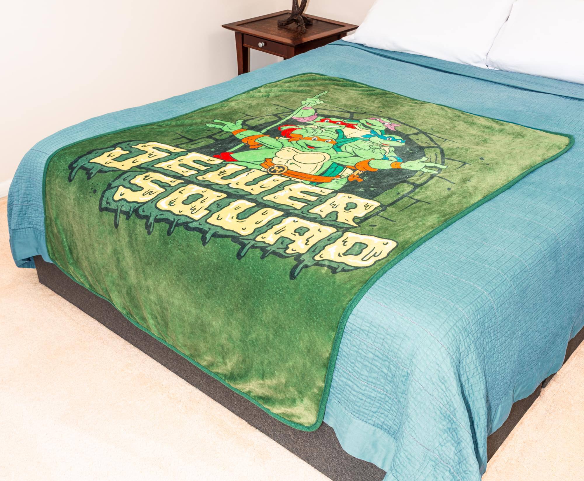 Alt View 2. Silver Buffalo - Teenage Mutant Ninja Turtles "Sewer Squad" Fleece Throw Blanket | 45 x 60 Inches - Green.