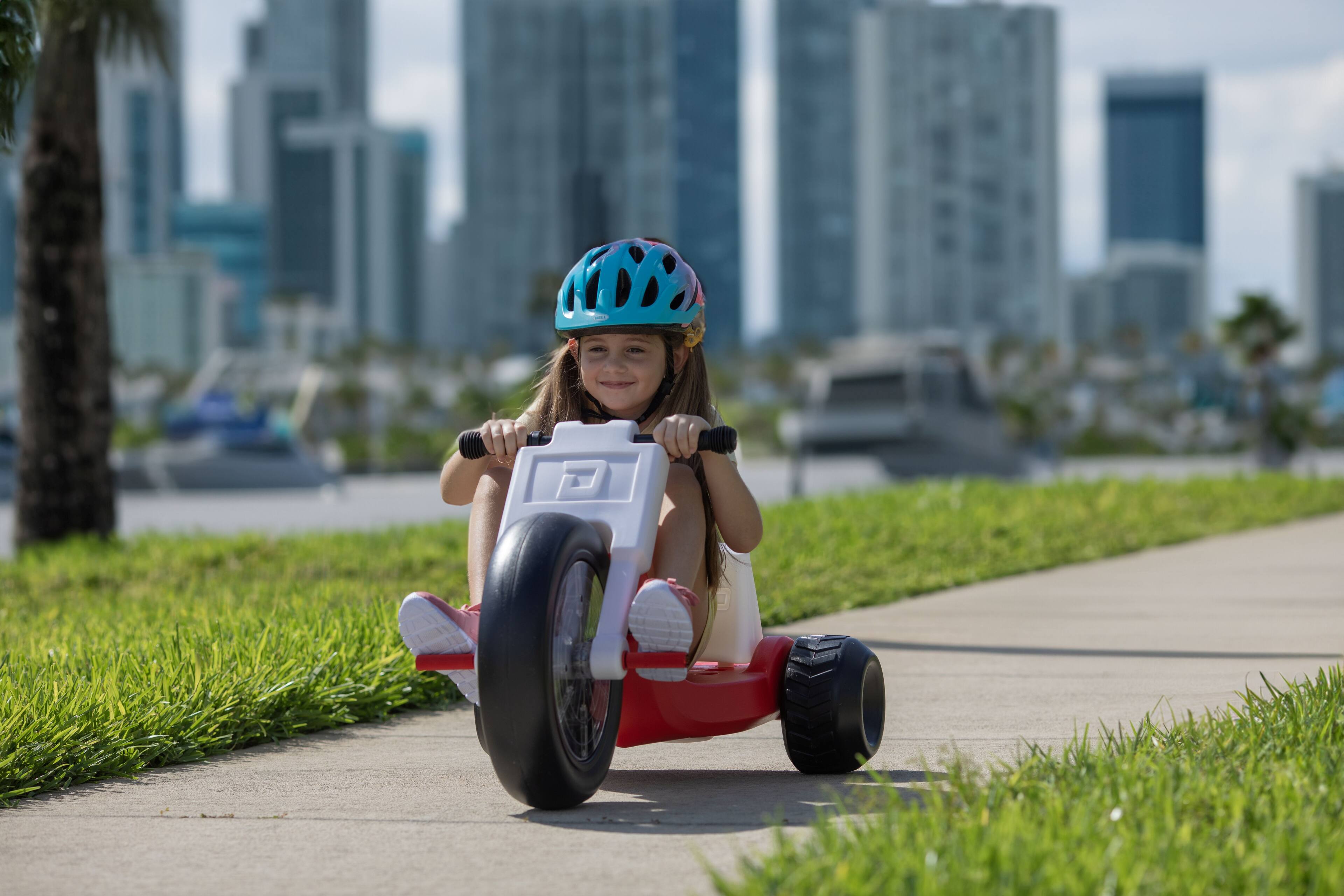 Alt View 3. Droyd - Romper Electric Tricycle for Kids 3+ w/ 3 mi Range & 6 mph Speed – Adjustable Seat, Parental Control & LEDs - Red.