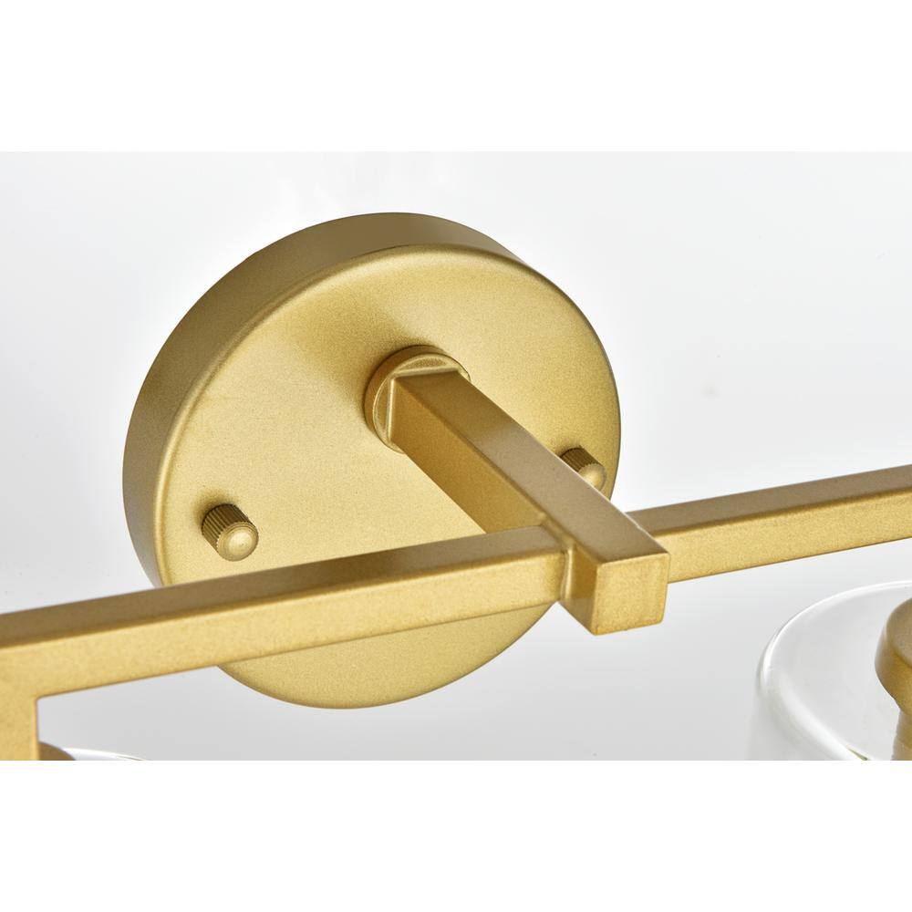 Left. Living District - Mayson 4 light Brass and Clear Bath Sconce - Brass And Clear.