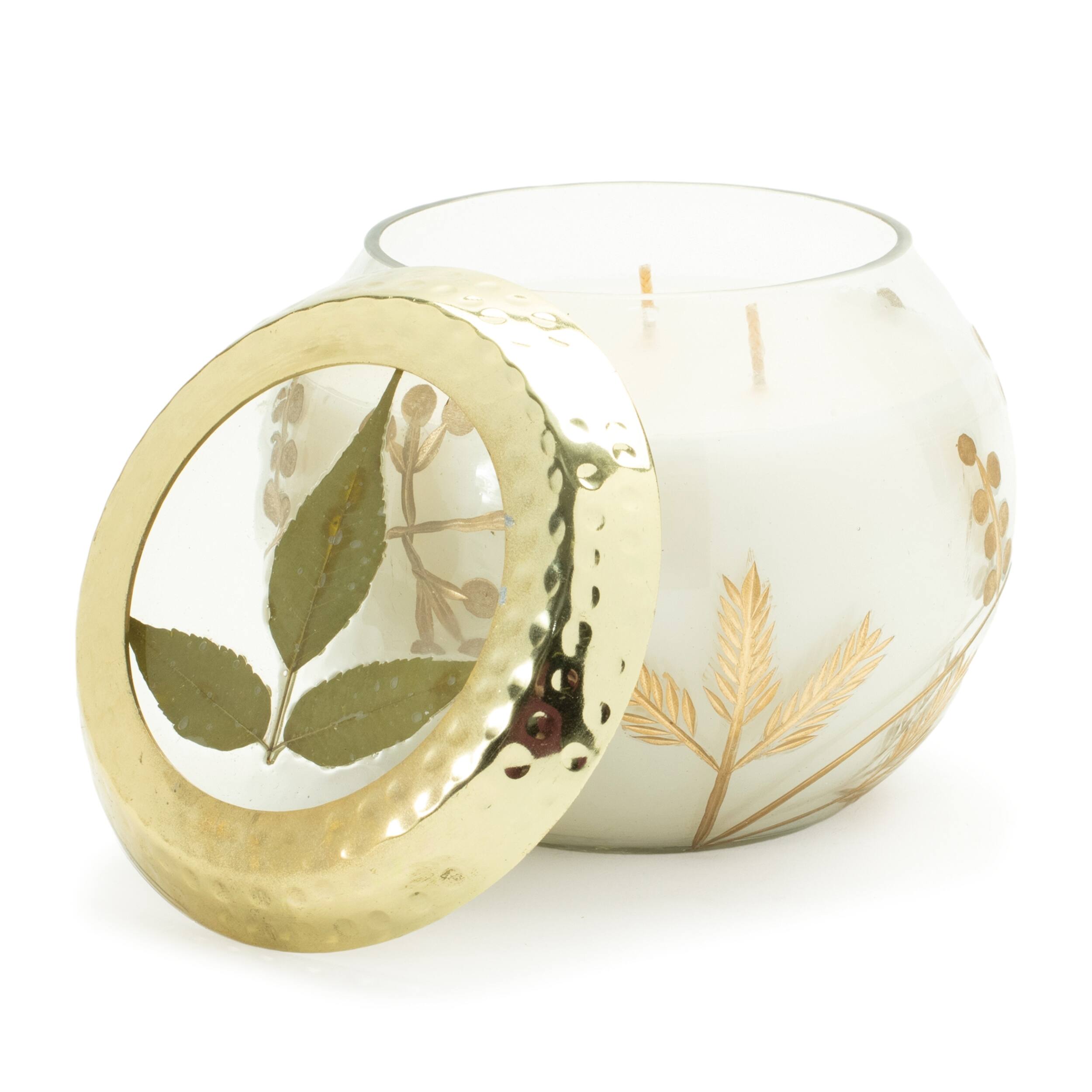 Left. BreeBe - Frosted Juniper Scented Soy Candle with Pressed Leaf Lid 5"D - White, Gold.