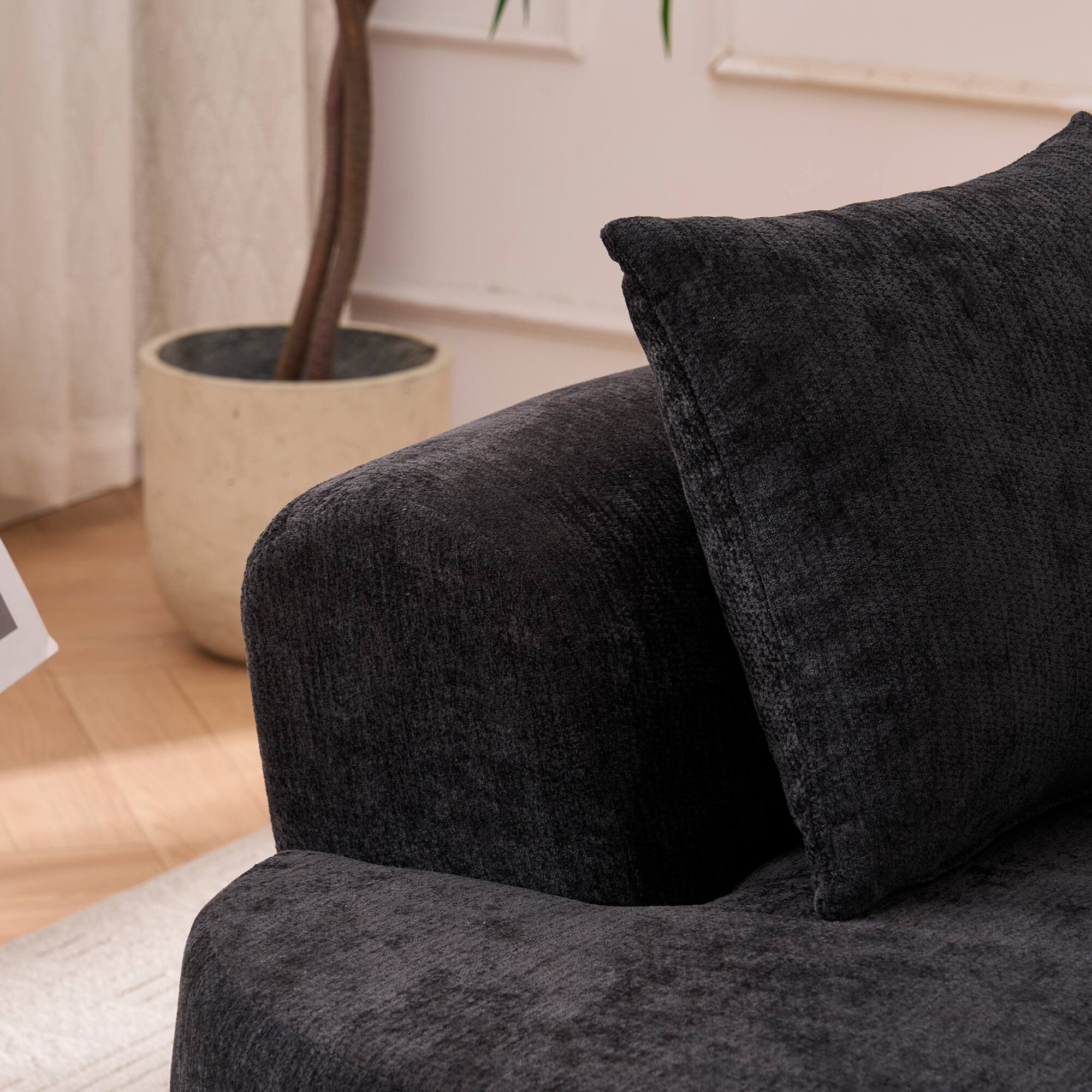 Left. GOODSILO - Modern Crescent-Shaped Sofa with Deep Cushions and Self-Inflating Foam, Three-Seater Design for Ultimate Comfort - Black.