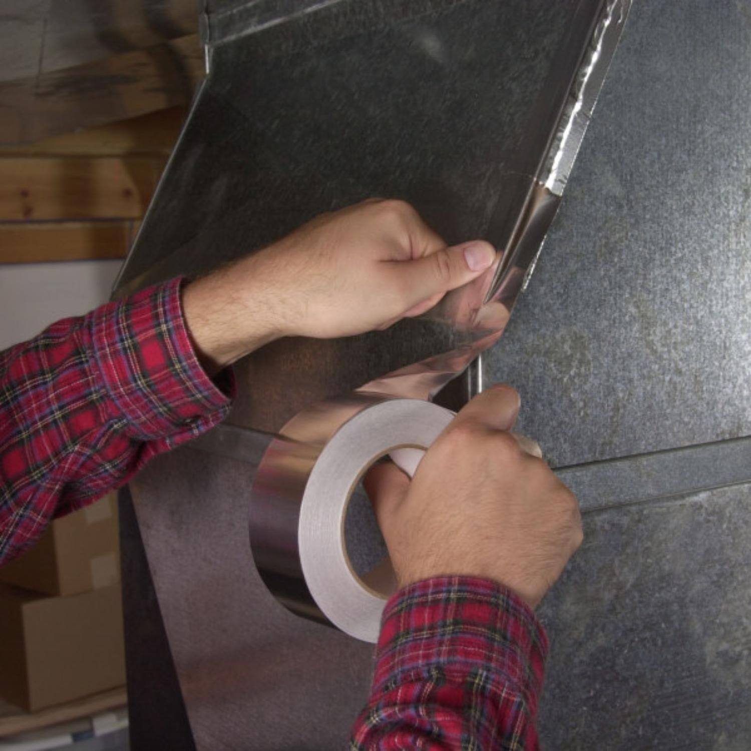 Left. Duck - Duck 1.88 in. W X 10 yd L Chrome Metal Repair Tape.