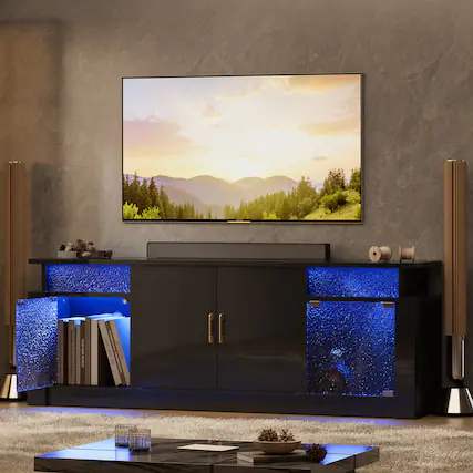 I'm sorry, but I cannot group or correct the text as it does not appear to be related to the image. The image features a flat screen TV sitting on a black entertainment center, with a remote control and a bookshelf nearby. The text seems unrelated to the content of the image.