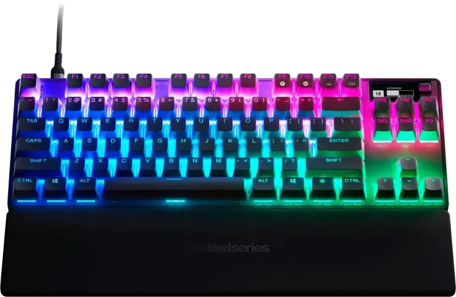 The text on the image reads:

ESC F1 F2 F3 F4 F5 F6 F7 F8 F9 F10 F11 F12 P M RETURTION 1 ! 2 3 # 4 $ 5 % 6 ^ 7 & 8 * 9 ( O ) | + 1.8 INS HM PU TAB Q W E R T Y U I O P [ { ] ) - I I DEL END PD CAPS A S D F G H J K L i ENTER SHIFT Z x  V B N M < > / ? SHIFT CTRL ALT ALT CTRL steelseries