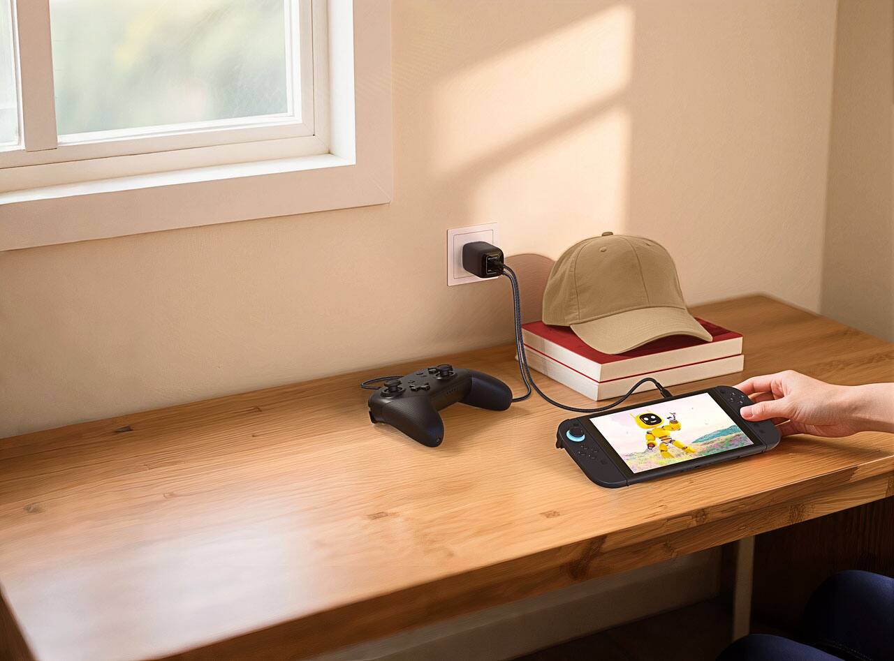 Left. Belkin - Gaming Dual USB-C Wall Charger 65W for Nintendo Switch 2, GaN Technology, USB-PD 3.0 PPS, Dual Charging Ports - Black.