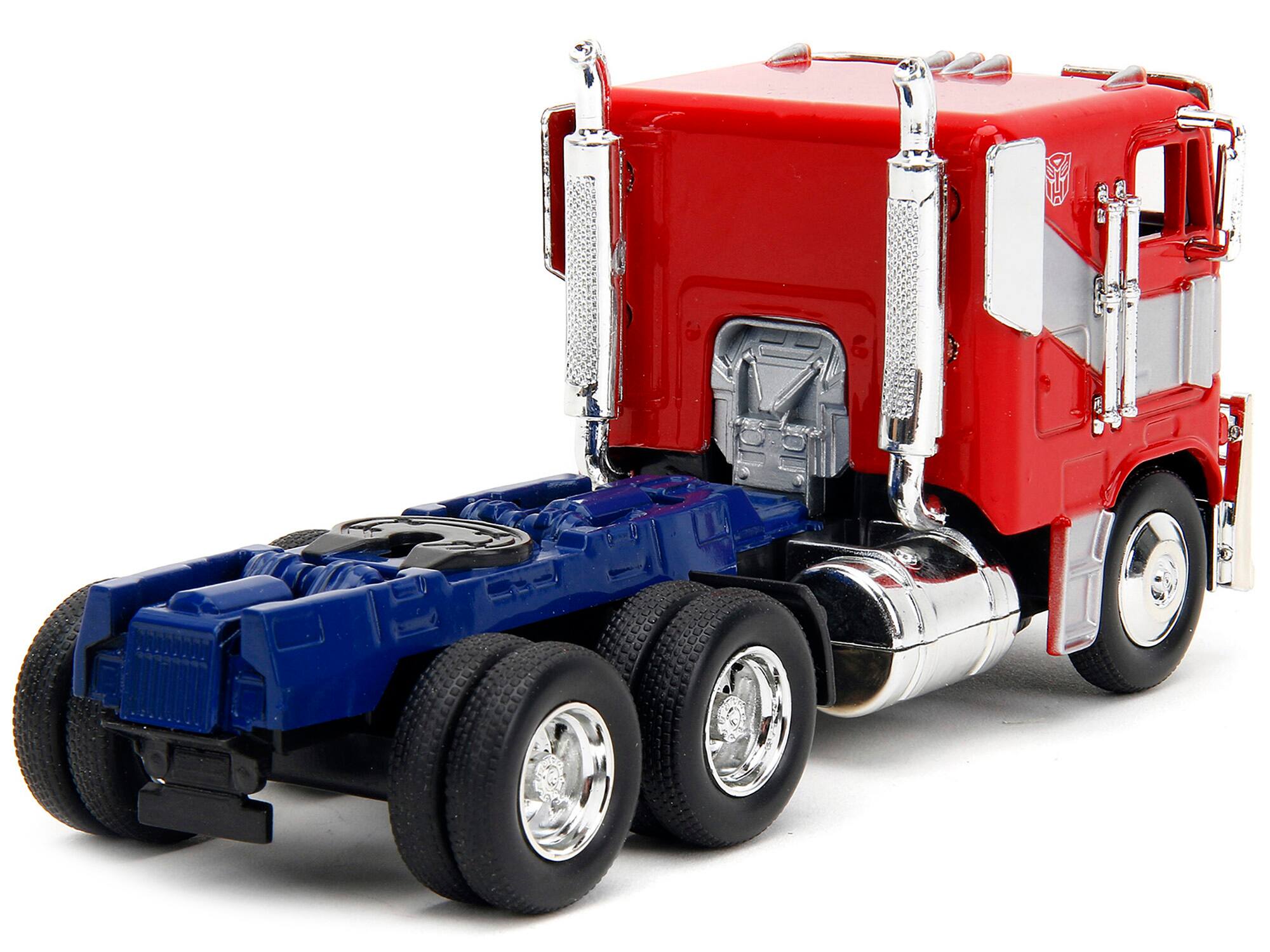 Left. Jada - Optimus Prime Tractor Truck Red & Blue w/ Silver Stripes Transformers Rise of the Beasts 2023 Movie Hollywood Rides 1/32 - Red And Blue With Silver.