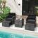 Alt View 1. Costway - 5 Piece Patio Rattan Furniture with 2 Ottomans & Tempered Glass Coffee Table - Black.