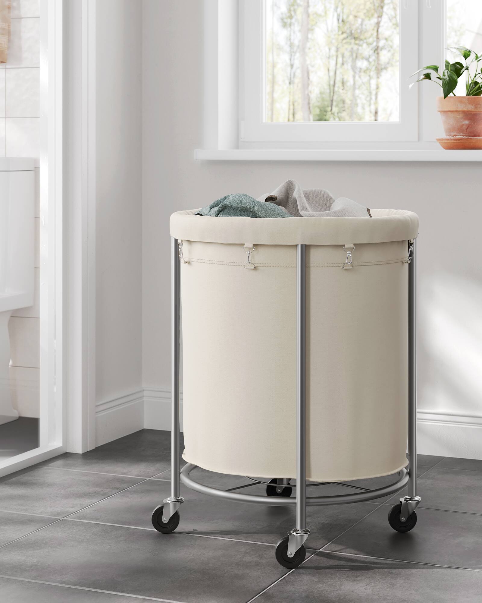 Alt View 5. Songmics Home - 50.2-Gallon(190 L)Laundry Basket with Wheels, Rolling Round Heavy-Duty Laundry Hamper Cart，Steel Frame,Removable Bag - Cream White and Metallic Silver.
