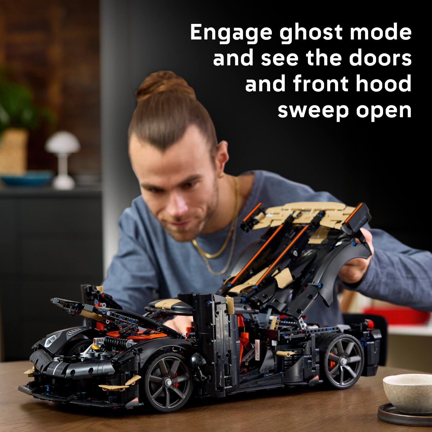 Engage ghost mode and see the doors and front hood sweep open