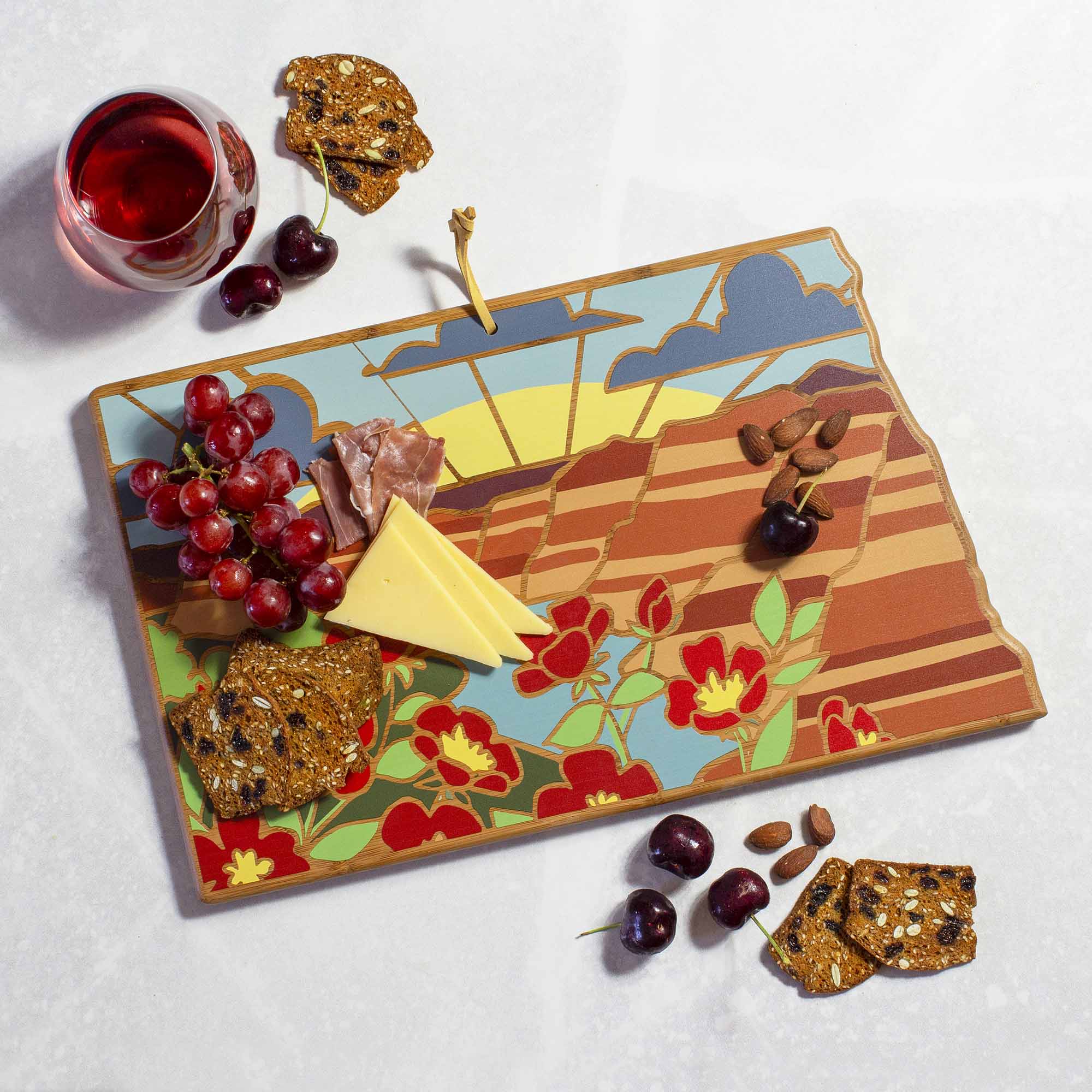 Angle. Totally Bamboo - North Dakota Cutting Board with Artwork by Summer Stokes.