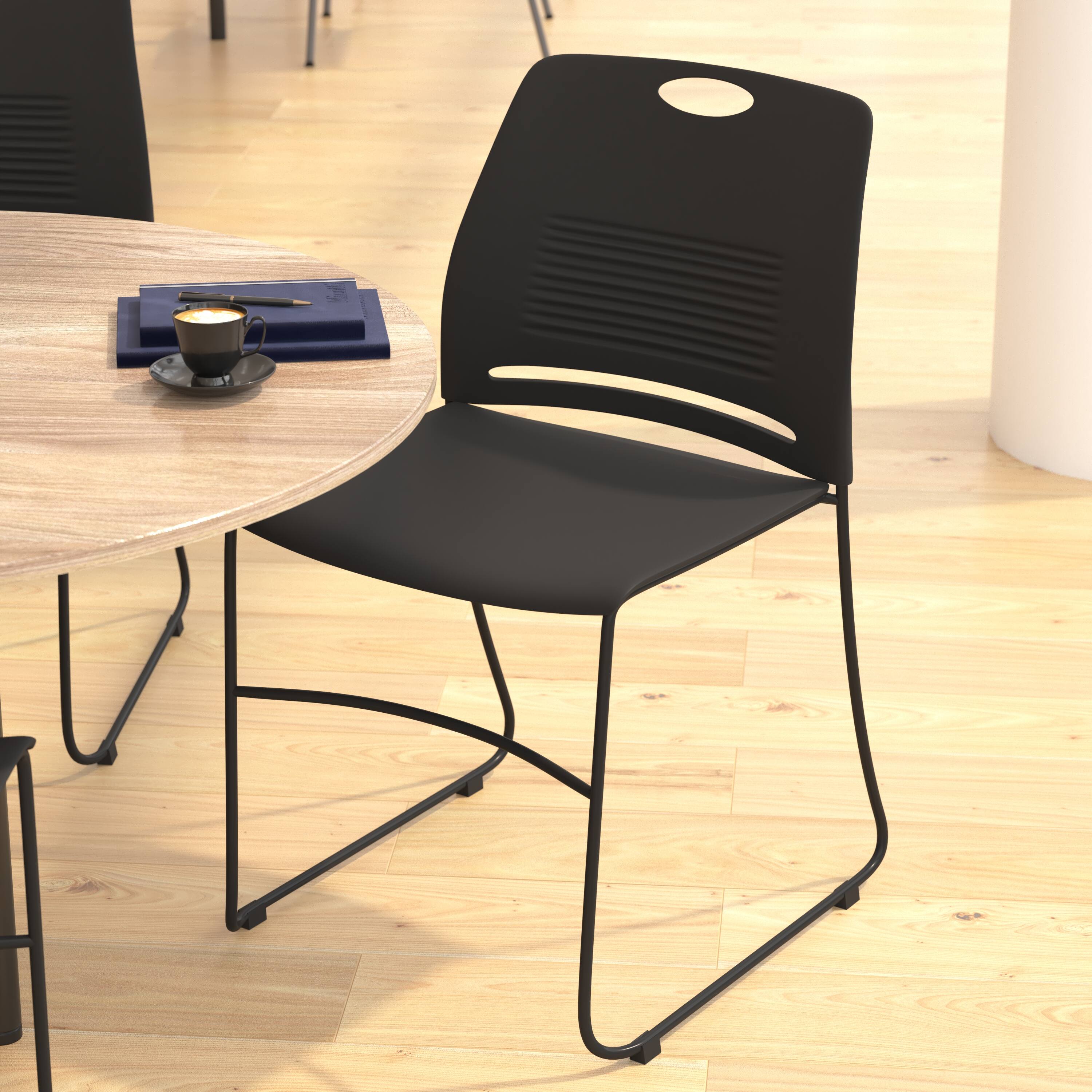 Alt View 4. Emma + Oliver - Heavy Duty 660 lb. Capacity Plastic Stack Chair with Steel Sled Base Frame - Black.