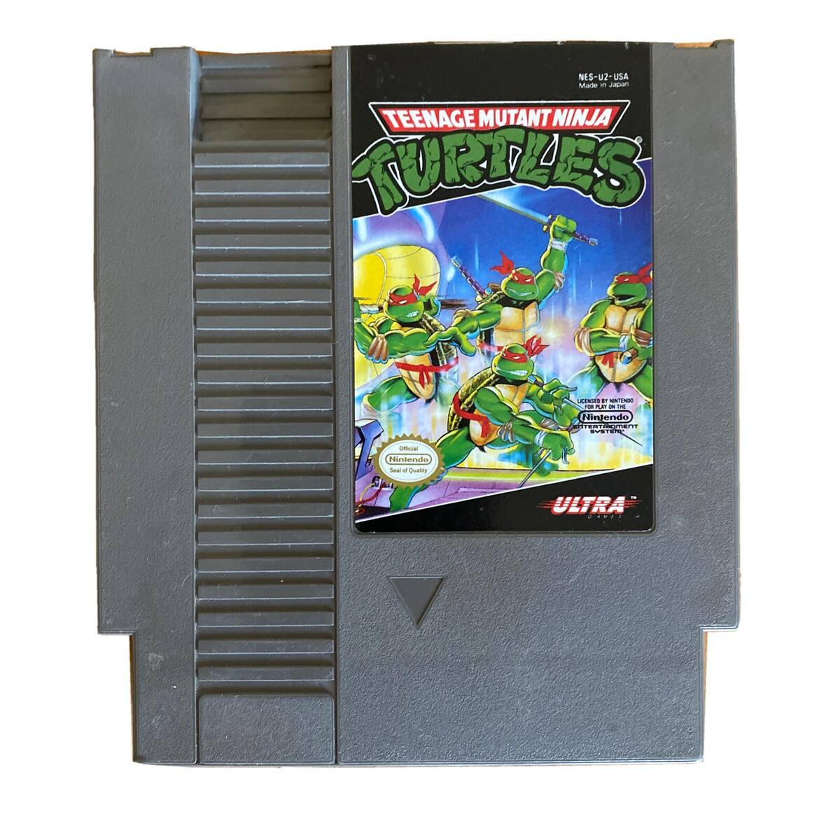 NES-U2-USA Made in Japan - TEENAGE MUTANT NINJA TURTLES - d - 1 Nintendo TERTIMETIST ..dn fcial Hintenda e Cruaie ULTRA .-P. - E (Everyone)