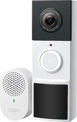 The image features a white door with a black camera on top of it. The camera is a Tapo doorbell, which has a wide field of view (160 FOV) and is designed for door security. The doorbell is placed next to a white speaker, which is also a part of the Tapo system. The combination of the camera and speaker provides a comprehensive security solution for the door, allowing users to monitor and communicate with visitors remotely.