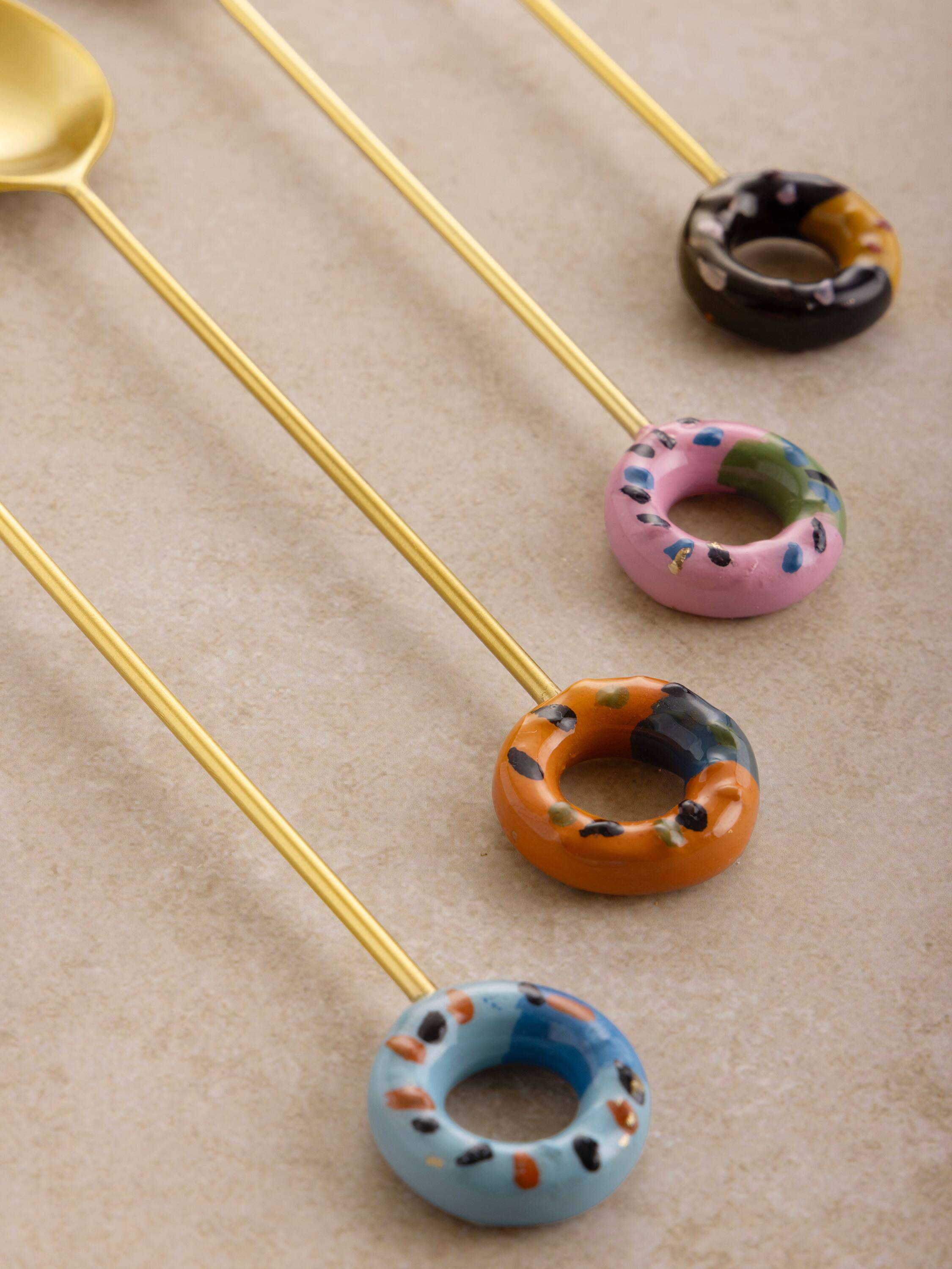 Left. GAURI KOHLI - Bursa Teaspoons - Multicolored, matte gold.