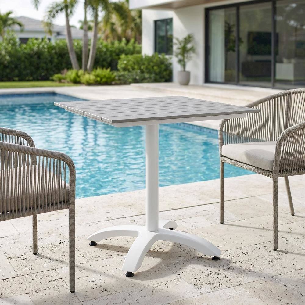 Left. Outdoor Escape - Outdoor Patio Dining Table With Modern Design And Durable Surface - Gray.