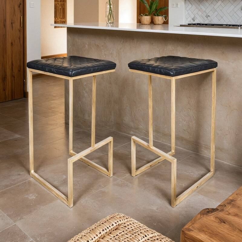 Left. LeisureMod - Quincy Modern Quilted Leather Bar Stool with Gold Metal Frame Counter Height Chair Set of 2 - Charcoal Black.