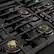 Left. ZLINE - 36 in. Wide 6 Burner Autograph Black StainlessParamount Rangetop with with Bronze Accents (PSRTBZ-36-CB) - Black Stainless Steel.