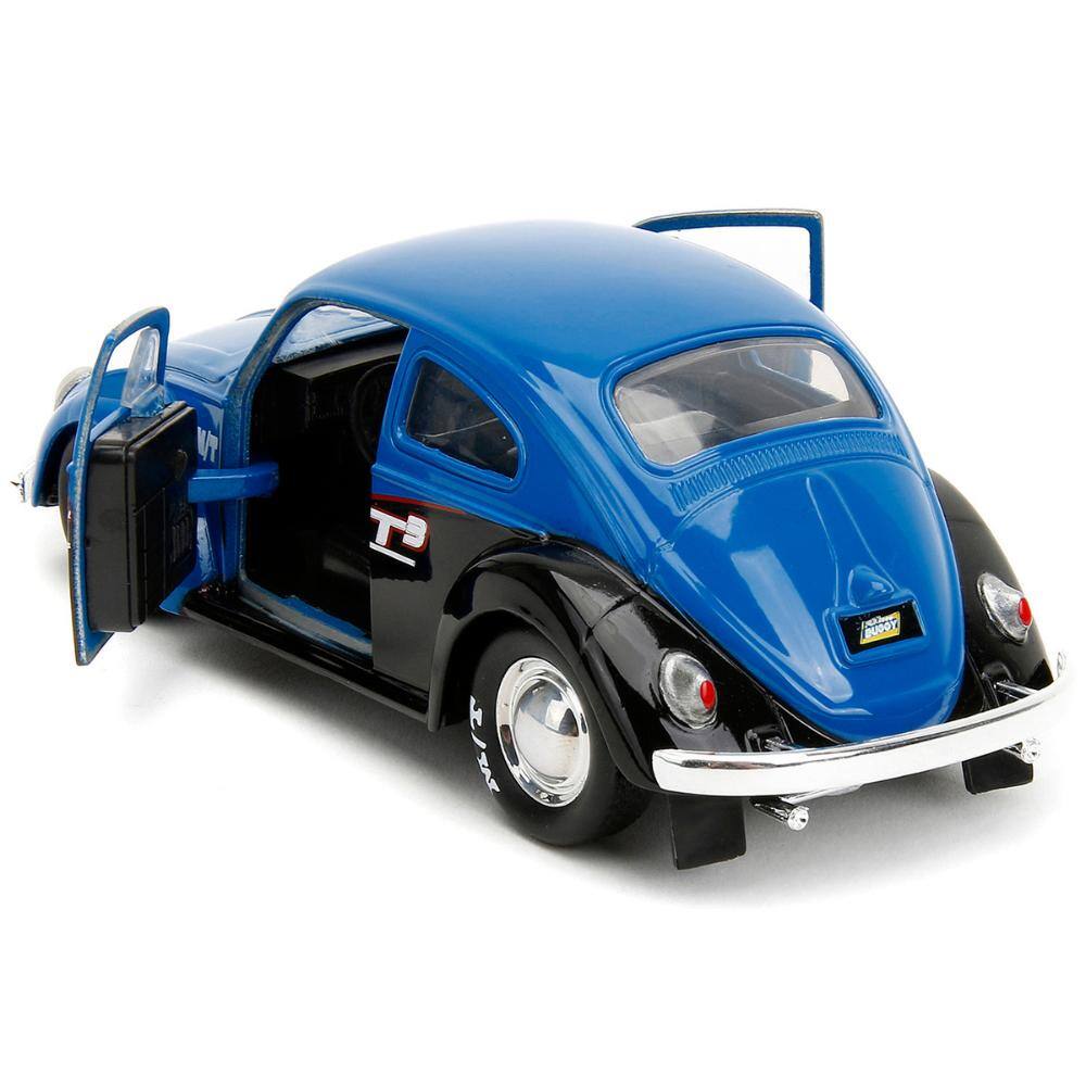 Left. Jada - 1959 Volkswagen Beetle "Spirit3 Racing" Blue and Black and Boxing Gloves Accessory "Punch Buggy" Series 1/32 - Blue and Black.