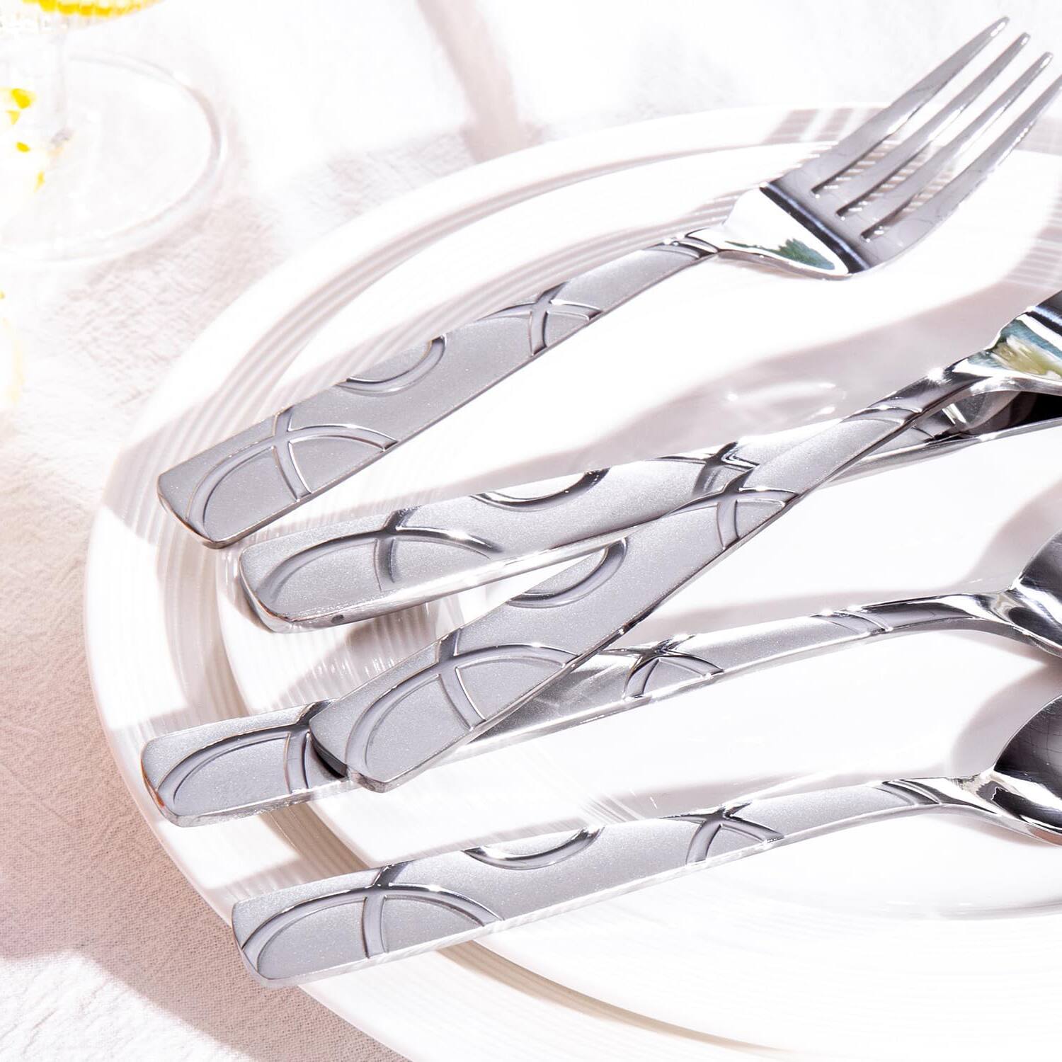 Angle. Dazzed Corner - 40PCS Stainless Steel Silverware Set, Mirror Polished Cutlery Set，Dishwasher Safe - Silver.