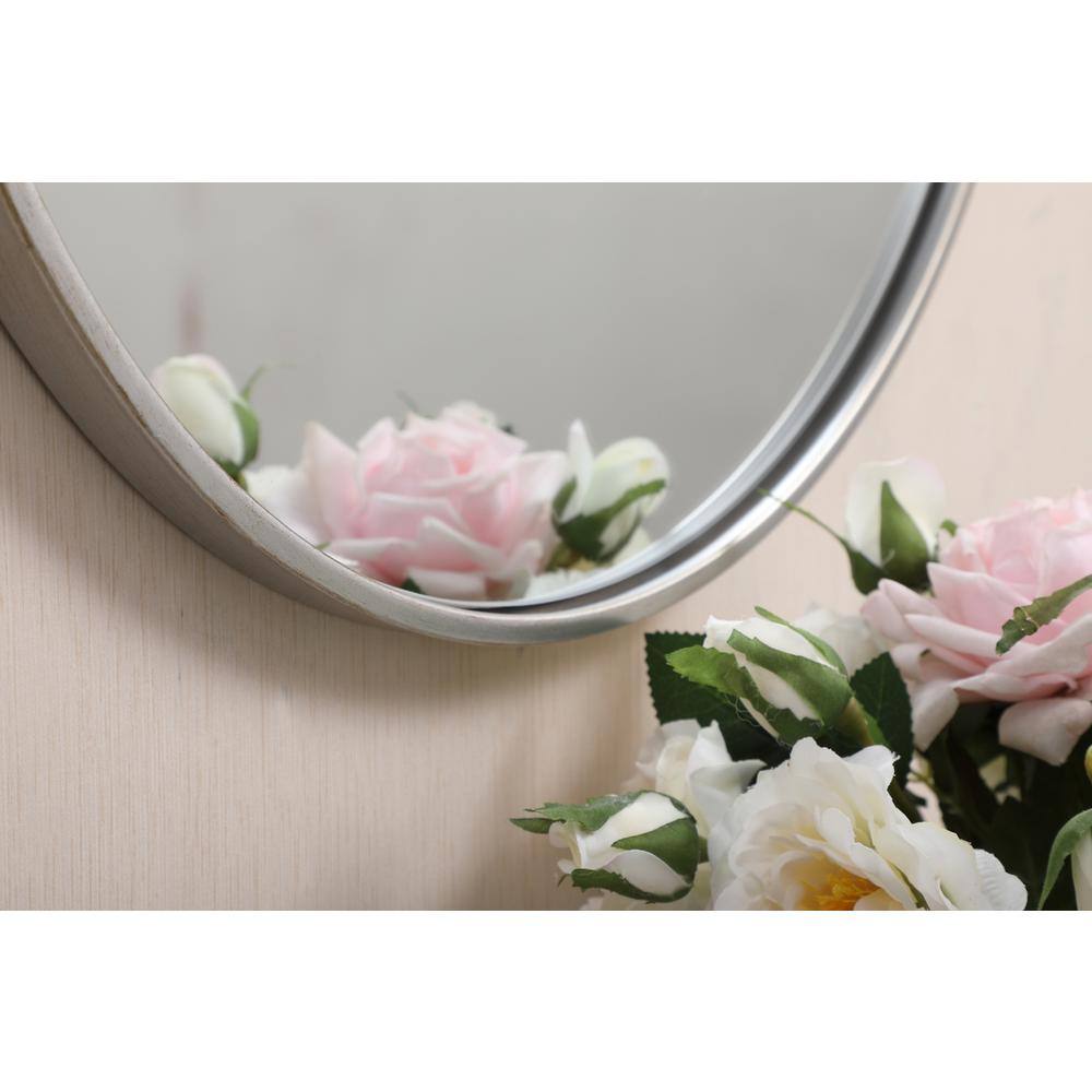 Left. Elegant Decor - Metal frame round mirror 21 inch in silver - Silver.