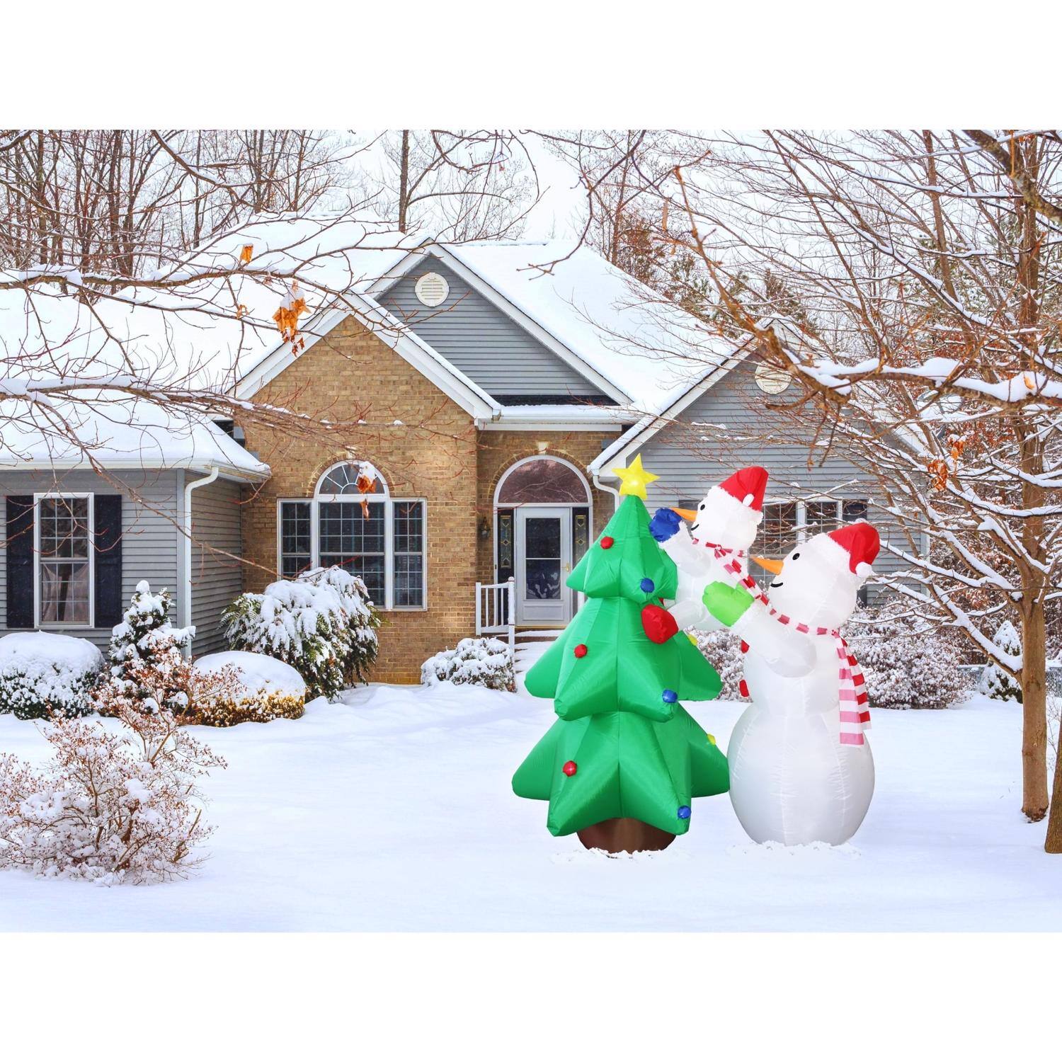 Left. Celebrations - Celebrations Snowman with Tree 6 ft. Inflatable - Multicolored.