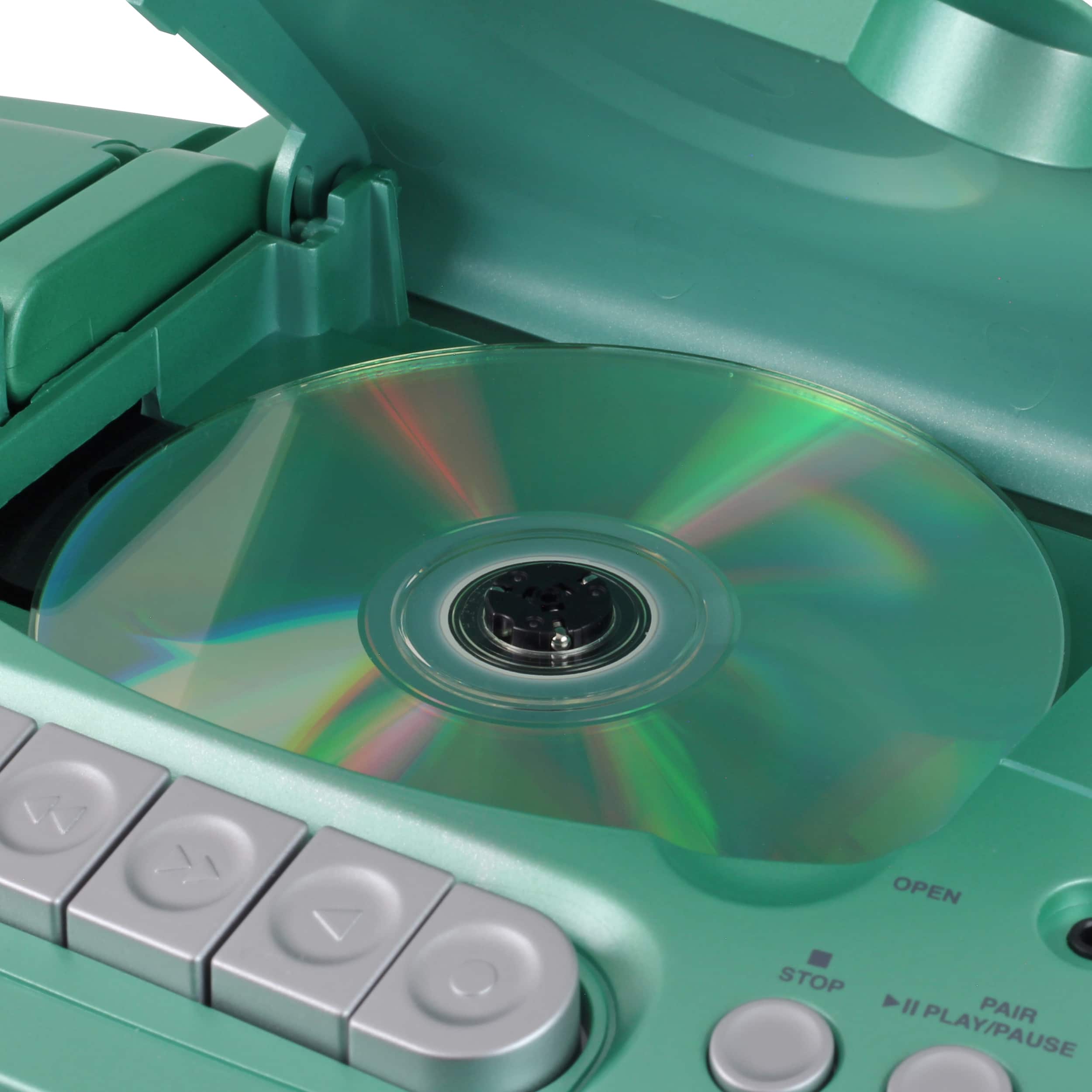 The text on the image reads "WV OPEN STOP 4 I PAIR PLAY/PAUSE." This text is likely related to the function of the device, which is a CD player. The "WV" could be an abbreviation for "Walkman," while "OPEN" and "STOP" are likely related to the device's playback controls. The "4 I PAIR" may refer to the pairing of the device with another device, such as a Bluetooth speaker or headphones. The "PLAY/PAUSE" button is a standard feature on many CD players, allowing users to start and stop the playback of a CD.