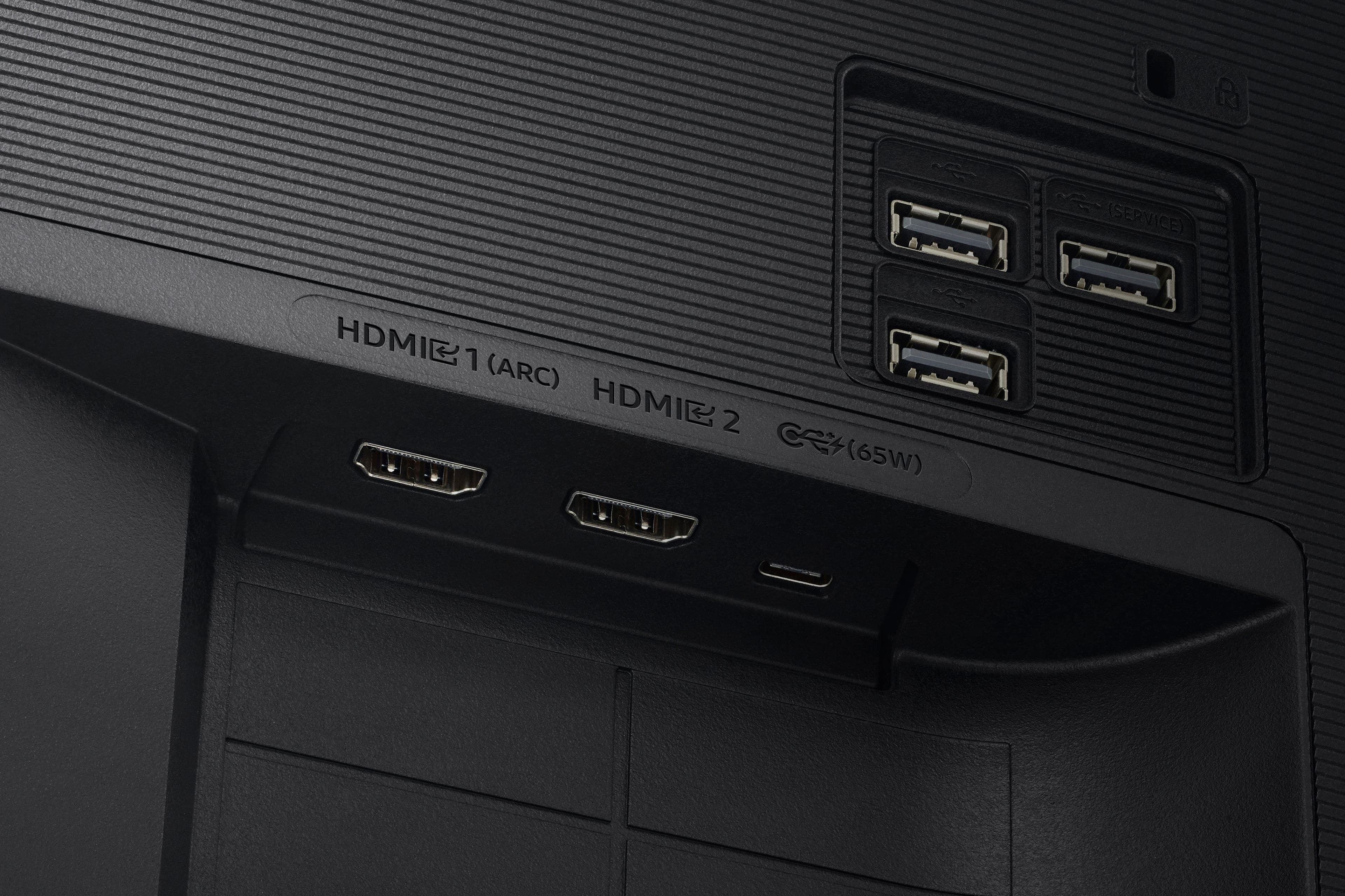 The text on the image reads:
(SERVICE) HDMI 1 (ARC) HDMI 2 (65W)