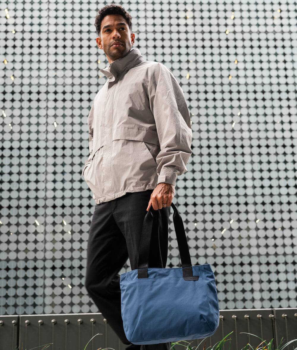 Angle. ALPAKA - Elements Tote 9L Small Tote Bag for 11" Devices - Blue Axoflux 210D.