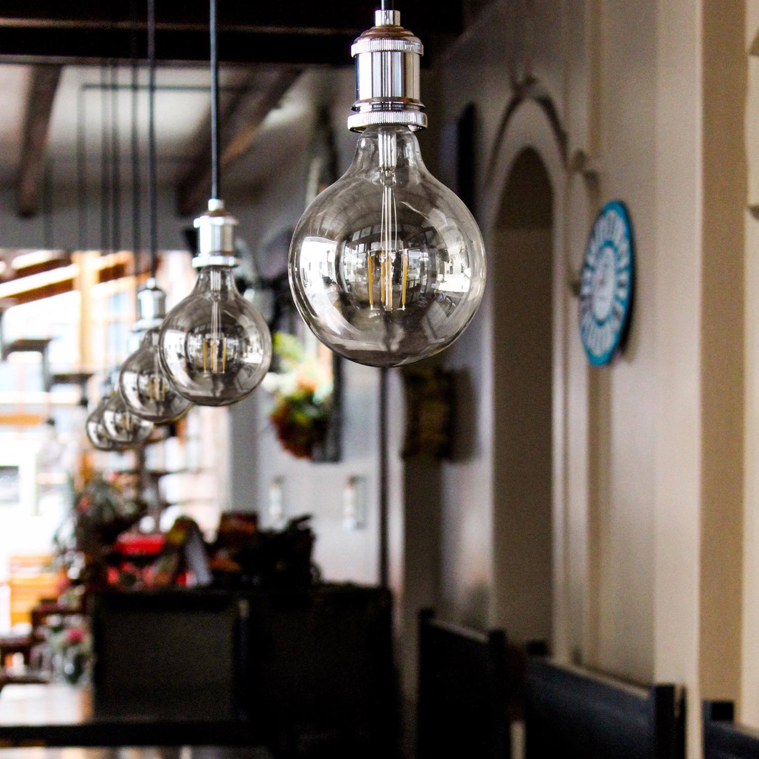 Left. FEIT ELECTRIC - Feit Enhance G25 E26 (Medium) Filament LED Bulb Soft White 60 Watt Equivalence 1 pk.