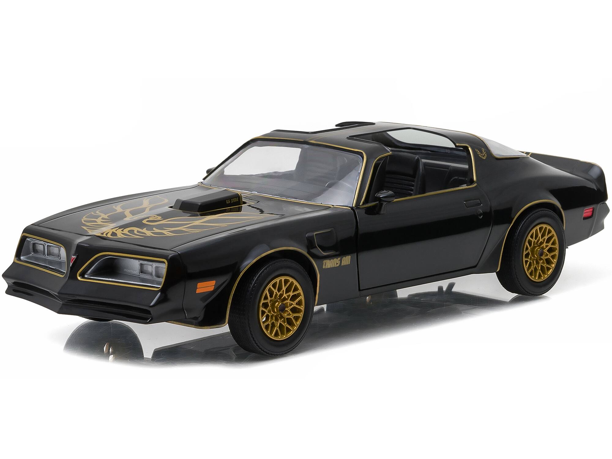 Angle. Greenlight - 1977 Pontiac Firebird Trans Am T/A Starlite Black with Golden Eagle Hood and Stripes 1/24 Diecast - Black With Golden.