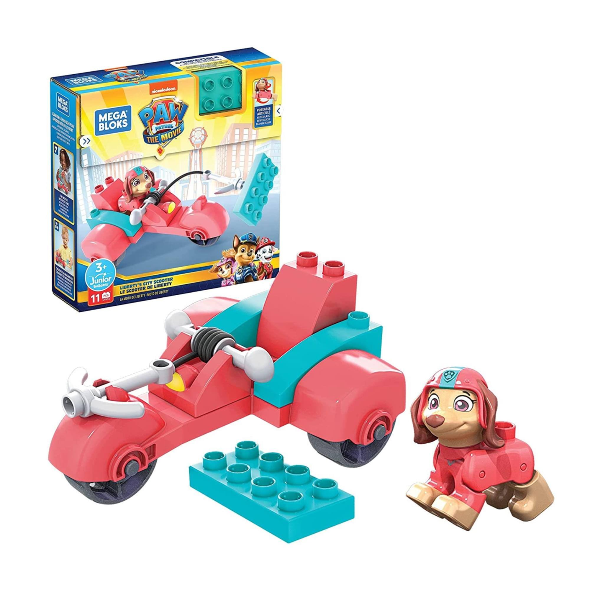 Sure, here is the corrected and grouped text from the image:

---

**Front of the Box:**

- **Mega Bloks**
- **Paw Patrol**
- **The Movie 2**
- **Junior**
- **3+**
- **Liberty's City Scooter**
- **Liberty's Scooter de la Ville**
- **11+ Large Mega Bloks**

**Side of the Box:**

- **Junior**
- **3+**
- **Liberty's City Scooter**
- **Liberty's Scooter de la Ville**

**Top of the Box:**

- **Mega Bloks**
- **Paw Patrol**
- **The Movie 2**

**Bottom Left of the Box:**

- **3+**

**Bottom Right of the Box:**

- **11+ Large Mega Bloks**

---