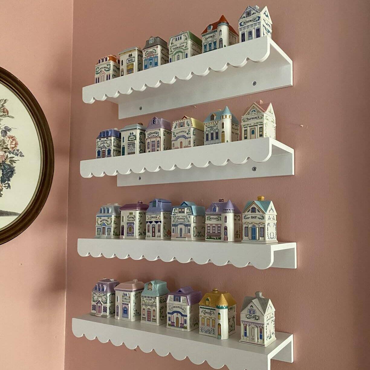 Sure, here is the corrected and grouped text from the image:

1. **Top Shelf:**
   - CHAPPELLE
   - CHAPPELLE
   - CHAPPELLE
   - CHAPPELLE
   - CHAPPELLE

2. **Second Shelf:**
   - CHAPPELLE
   - CHAPPELLE
   - CHAPPELLE
   - CHAPPELLE
   - CHAPPELLE

3. **Third Shelf:**
   - CHAPPELLE
   - CHAPPELLE
   - CHAPPELLE
   - CHAPPELLE
   - CHAPPELLE

4. **Bottom Shelf:**
   - CHAPPELLE
   - CHAPPELLE
   - CHAPPELLE
   - CHAPPELLE
   - CHAPPELLE

Each tin has the word "CHAPPELLE" on it.