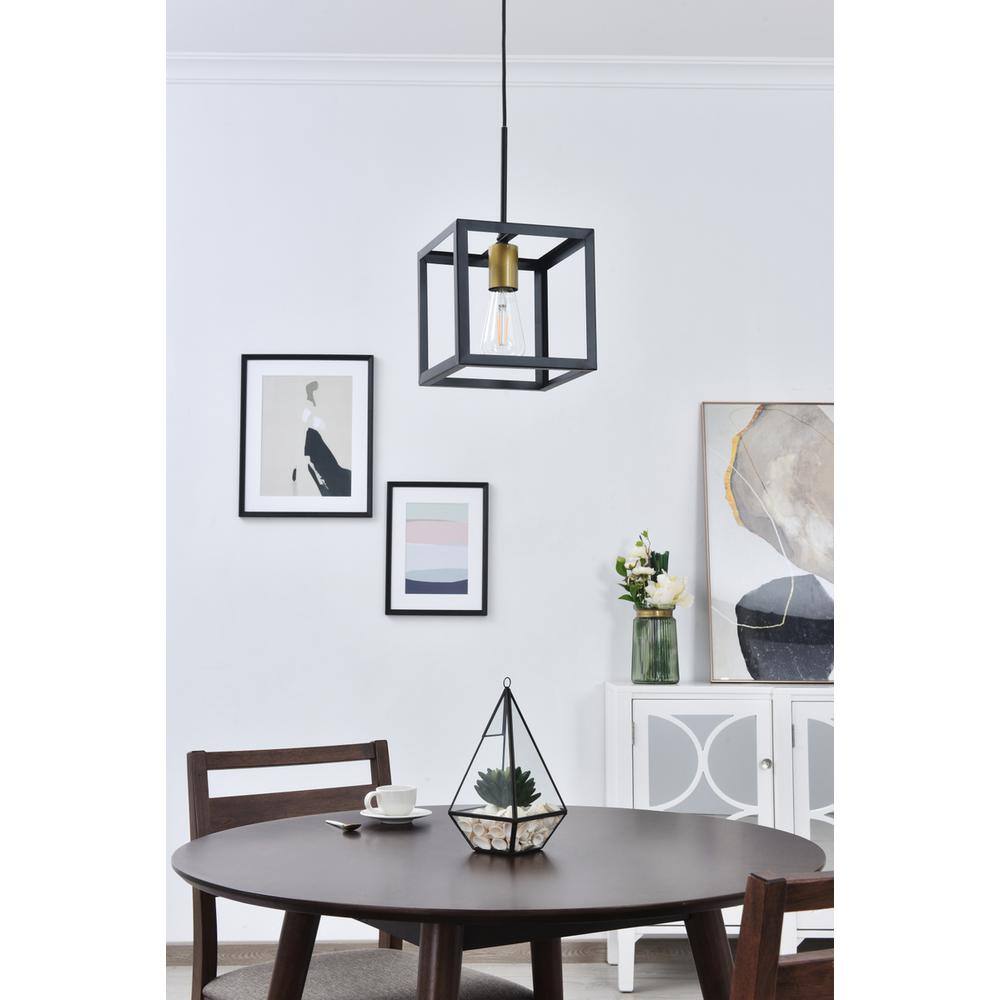 Left. Living District - Resolute 1 light brass and black Pendant - Brass And Black.