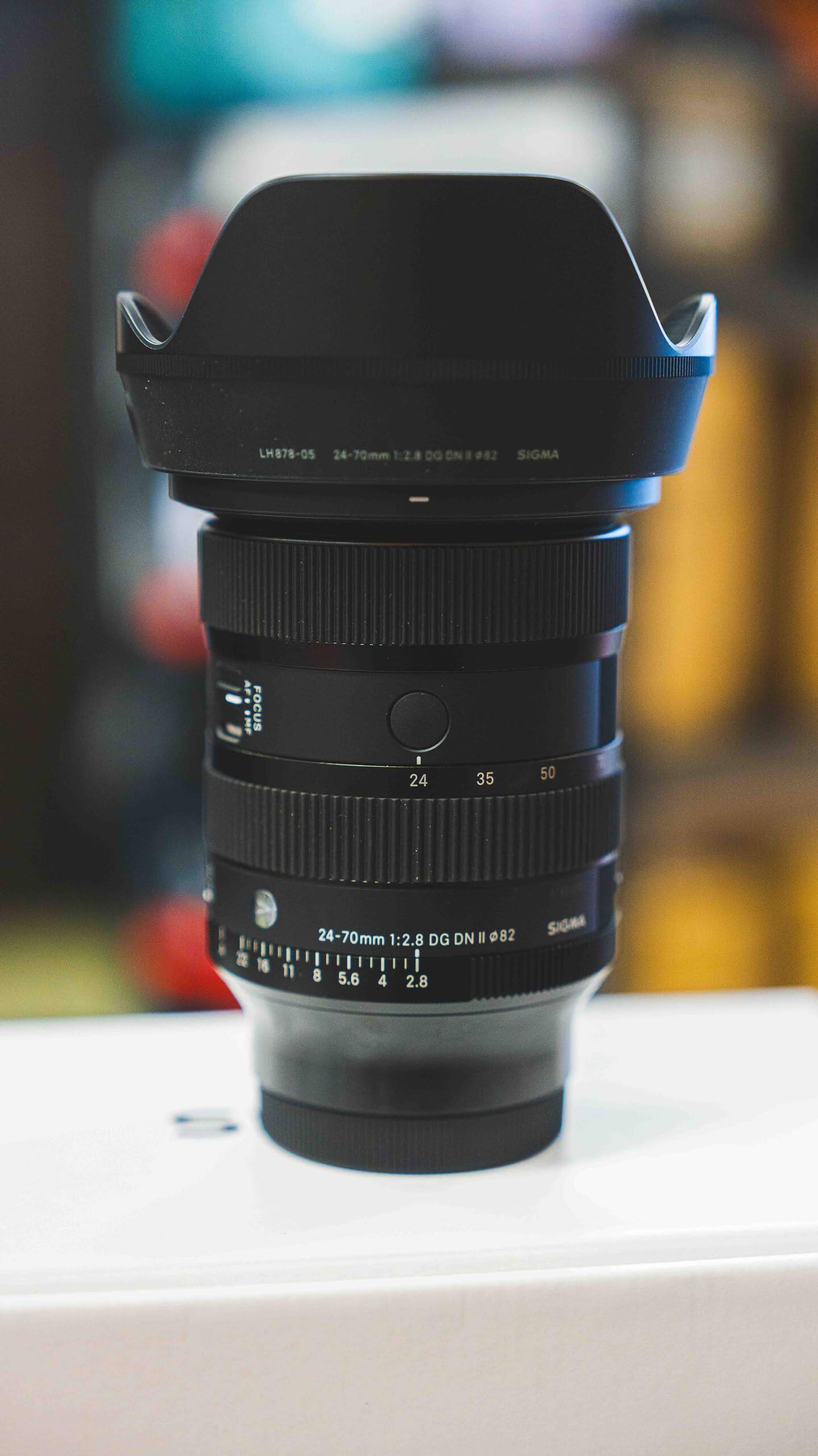 LH878-05 24-70mm 1:2.8 DG DN | 982 SIGMA AF. MF FOCUS 24 35 50 a 16 24-70mm 1:2.8 DG DN Il 82 I 11 8 5.6 4 2.8 SIGMA