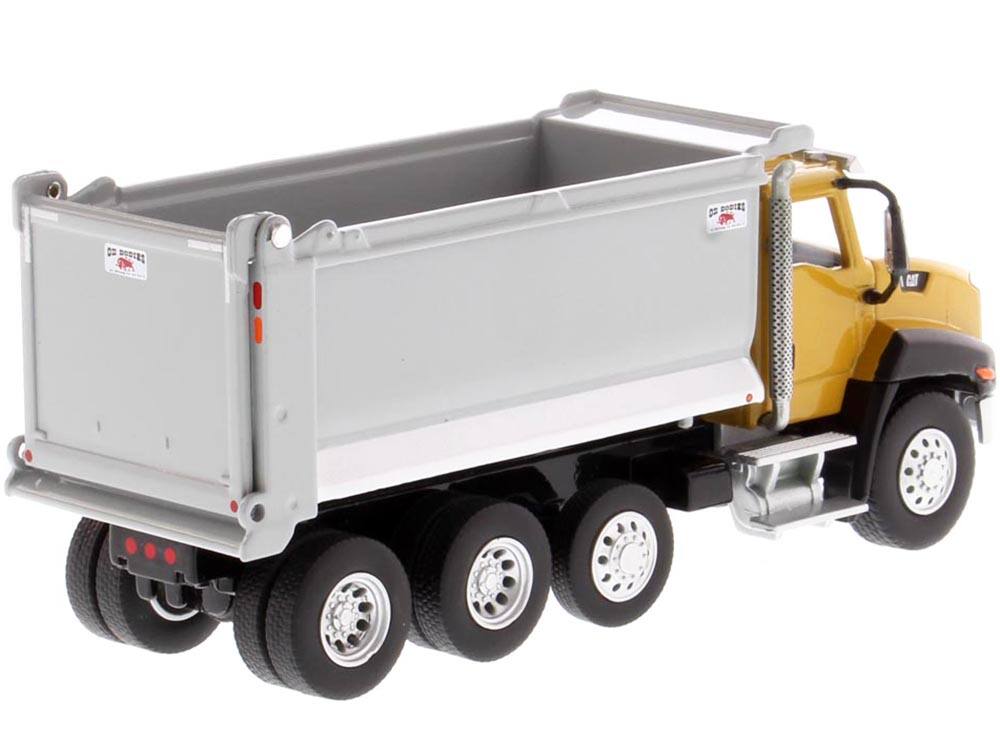 Back. Diecast Masters - CAT Caterpillar CT660 Day Cab Tractor with OX Stampede Dump Truck "Play & Collect!" Series 1/64 Diecast - Yellow .