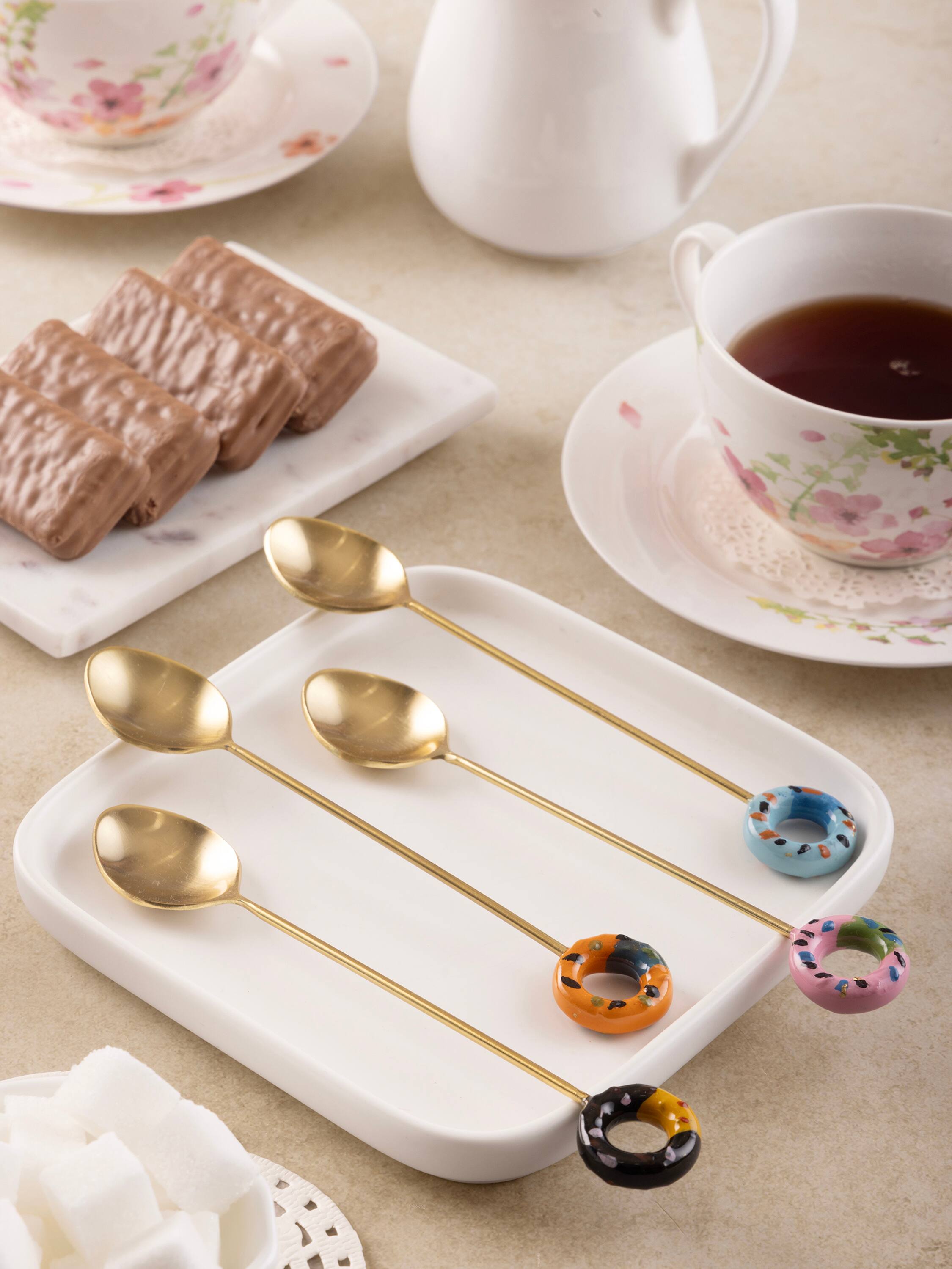 Angle. GAURI KOHLI - Bursa Teaspoons - Multicolored, matte gold.