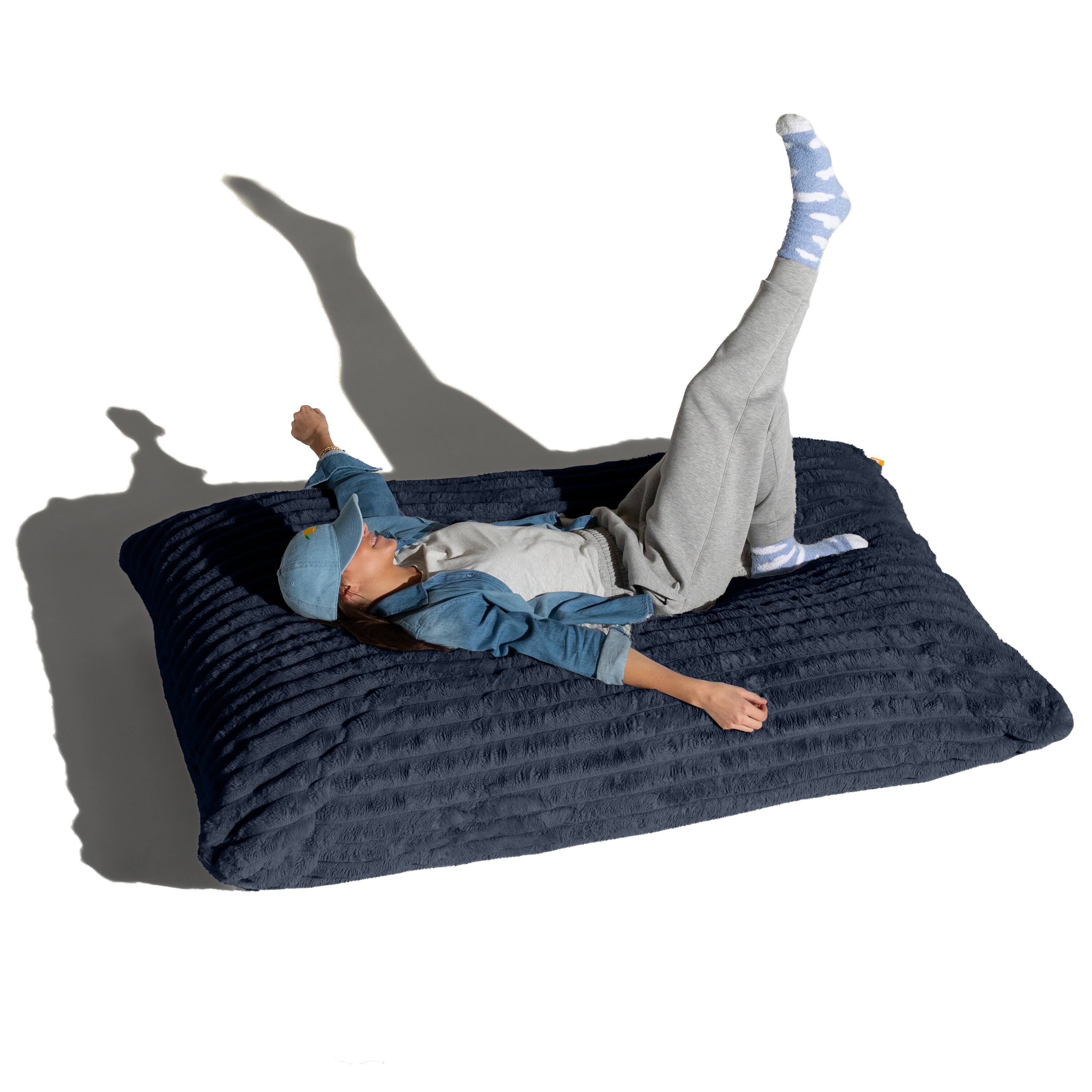 Angle. Jaxx - Pillow Saxx Bean Bag Rocking Chair - Elegant Oversized Rocker with Modern Wood Frame, Mondo Fur Midnight Blue - Mondo Fur Midnight Blue.