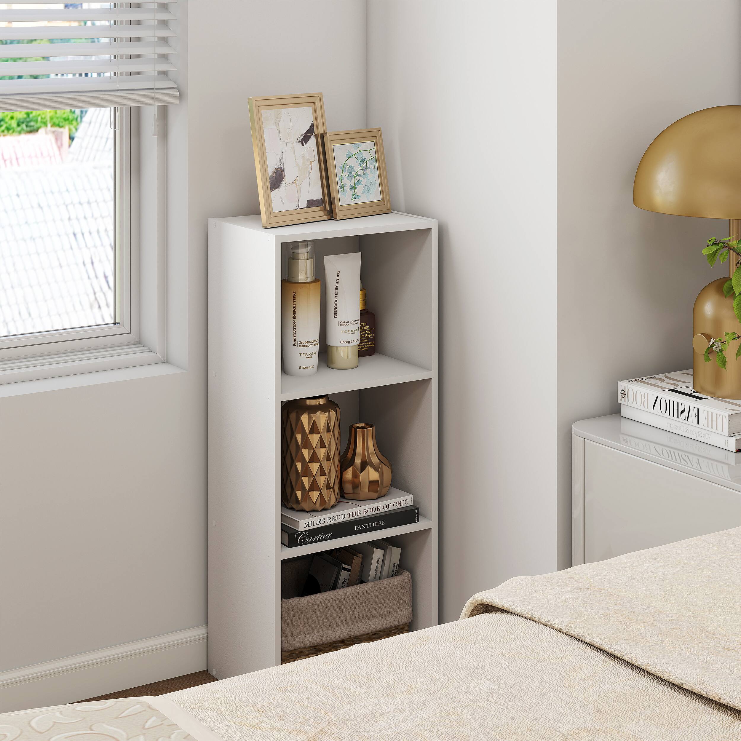 Sure, here is the corrected and grouped text from the image:

---

**Top Shelf:**
- Framed pictures

**Second Shelf:**
- "TERRA" bottle
- "TERRA" bottle

**Third Shelf:**
- "MILES REDD THE BOOTH" by "PANTHERE"
- "BOOK OF CHIC" by "PANTHERE"

**Bottom Shelf:**
- Books and magazines

**Nightstand:**
- "BOOK OF CHIC" by "PANTHERE"
- "MILES REDD THE BOOTH" by "PANTHERE"
- "BOOK OF CHIC" by "PANTHERE"
- "MILES REDD THE BOOTH" by "PANTHERE"
- "BOOK OF CHIC" by "PANTHERE"
- "MILES REDD THE BOOTH" by "PANTHERE"
- "BOOK OF CHIC" by "PANTHERE"
- "MILES REDD THE BOOTH" by "PANTHERE"
- "BOOK OF CHIC" by "PANTHERE"
- "MILES REDD THE BOOTH" by "PANTHERE"
- "BOOK OF CHIC" by "PANTHERE"
- "MILES REDD THE BOOTH" by "PANTHERE"
- "BOOK OF CHIC" by "PANTHERE"
- "MILES REDD THE BOOTH" by "PANTHERE"
- "BOOK OF CHIC" by "PANTHERE"
- "MILES REDD THE BOOTH" by "PANTHERE"
- "BOOK OF CHIC" by "PANTHERE"
- "MILES REDD THE BOOTH" by "PANTHERE"
- "BOOK OF CHIC" by "PANTHERE"
- "MILES REDD THE BOOTH" by "PANTHERE"
- "BOOK OF CHIC" by "PANTHERE"
- "MILES REDD THE BOOTH" by "PANTHERE"
- "BOOK OF CHIC" by "PANTHERE"
- "MILES REDD THE BOOTH" by "PANTHERE"
- "BOOK OF CHIC" by "PANTHERE"
- "MILES REDD THE BOOTH" by "PANTHERE"
- "BOOK OF CHIC" by "PANTHERE"
- "MILES REDD THE BOOTH" by "PANTHERE"
- "BOOK OF CHIC" by "PANTHERE