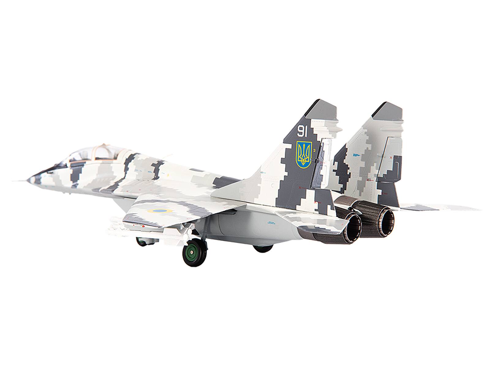 Left. JC Wings - Mikoyan MiG-29UB Fulcrum-B Fighter Aircraft Vasylkiv Air Base Ukraine (2021) Ukrainian Air Force 1/72 Diecast Model - White, Grey.