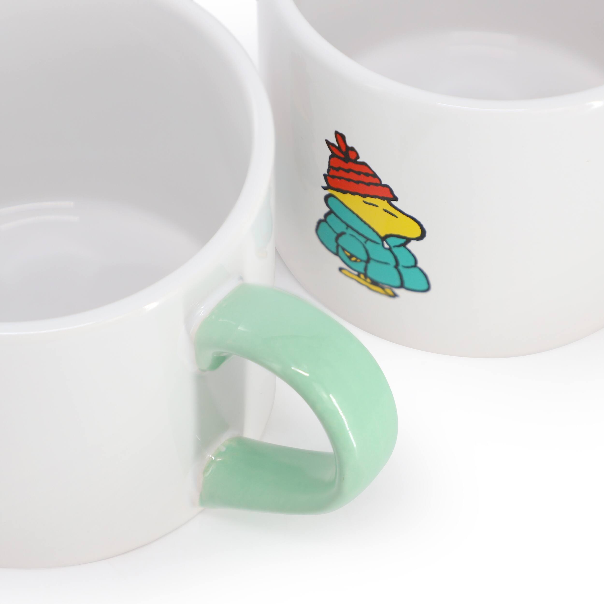 Alt View 2. Peanuts - Peanuts All Bundled Up 4 Piece 19 Ounce Stackable Stoneware Mug Set - Assorted.