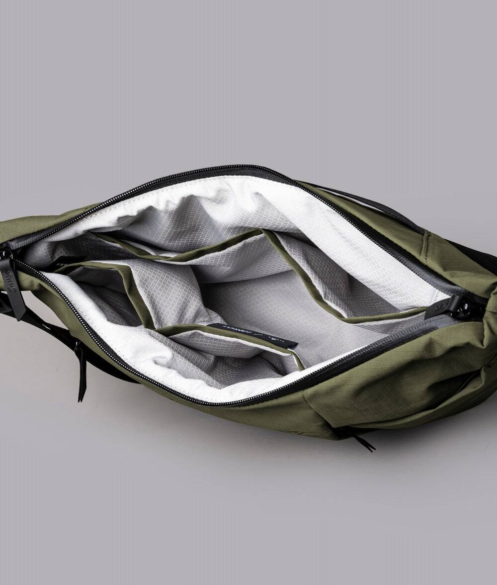 Alt View 5. ALPAKA - Flow Satchel 4L Crossbody Bag, Water Resistant Shoulder Bag, Expandable Bottle Pocket, YKK Zippers - Green Axoflux 210D.