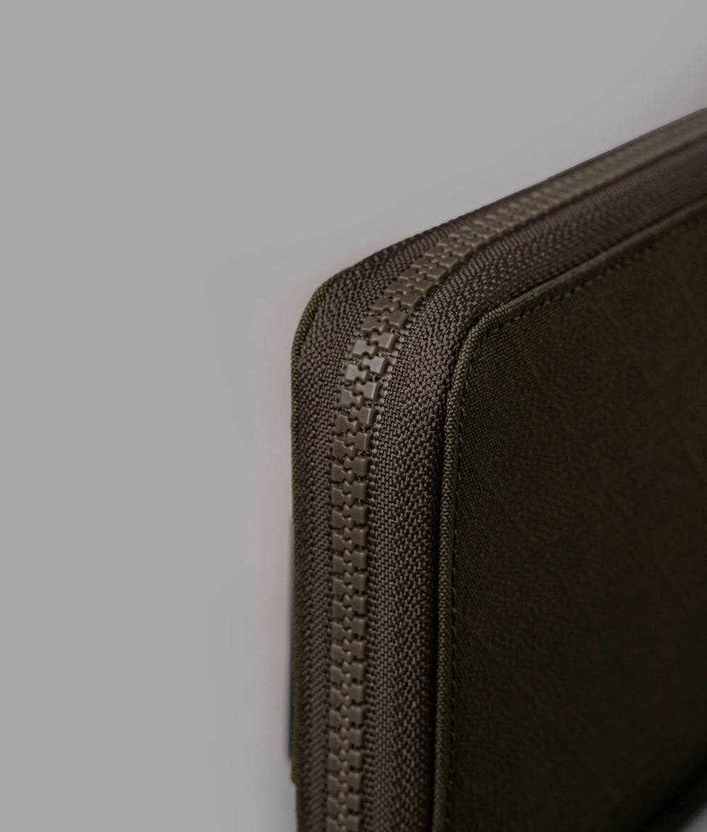 Alt View 8. ALPAKA - RFID Zip Passport Wallet with Boarding Pass Pocket, 7 Card Slots, Magnetic Flaps, Detachable Hand Strap - Army Green Axogrid 300D.