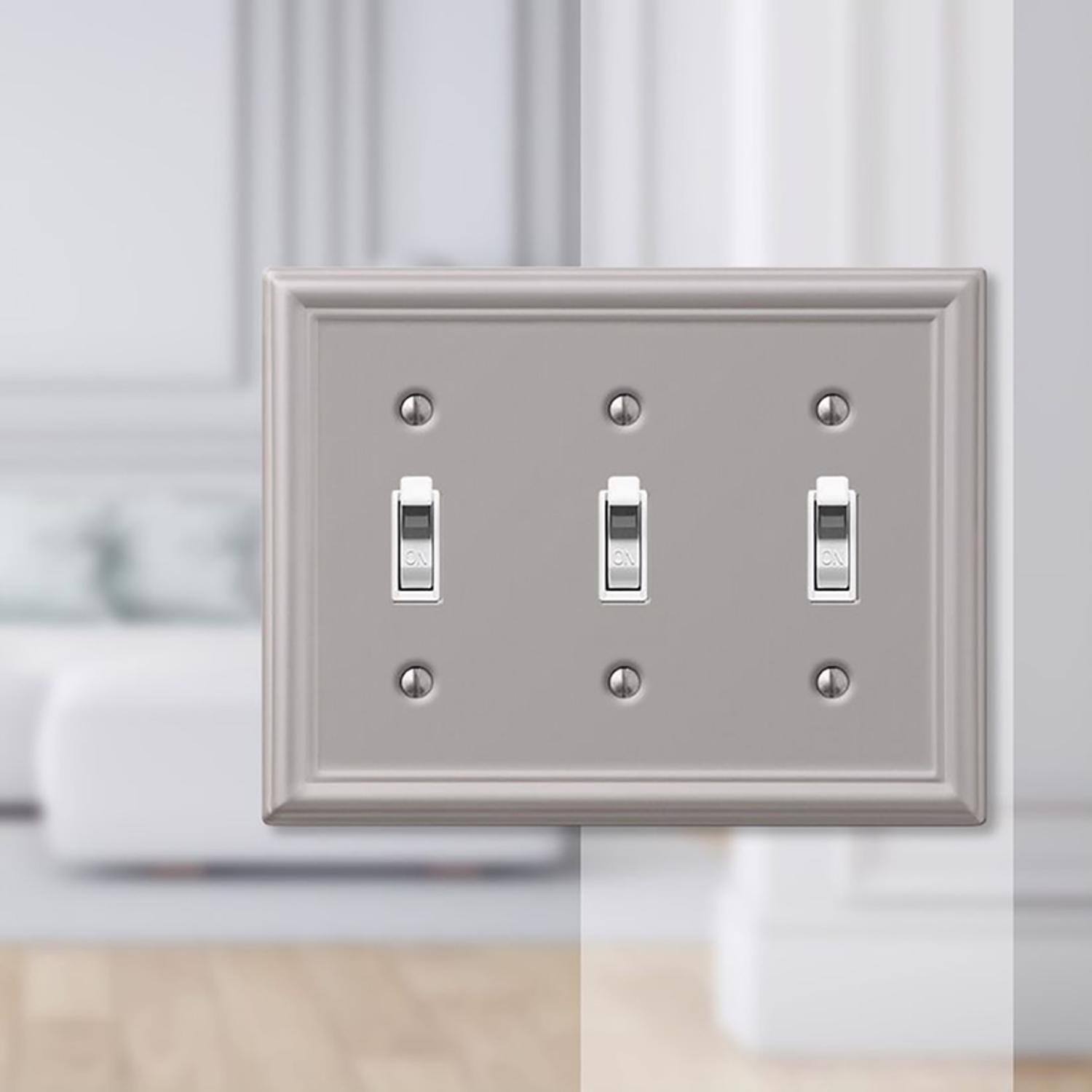 Left. AMERELLE - Amerelle Chelsea Brushed Nickel 3 gang Stamped Steel Toggle Wall Plate 1 pk - Nickel.