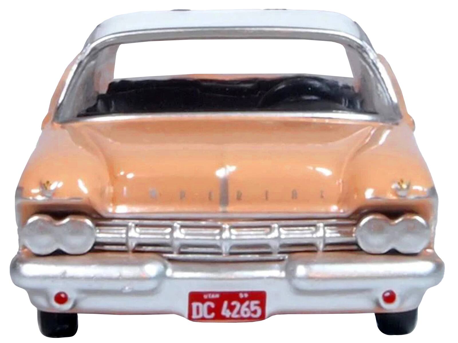 Left. Oxford Diecast - 1959 Chrysler Imperial Crown 2 Door Hardtop Persian Pink with White Top 1/87 (HO) Scale - Pink With White.