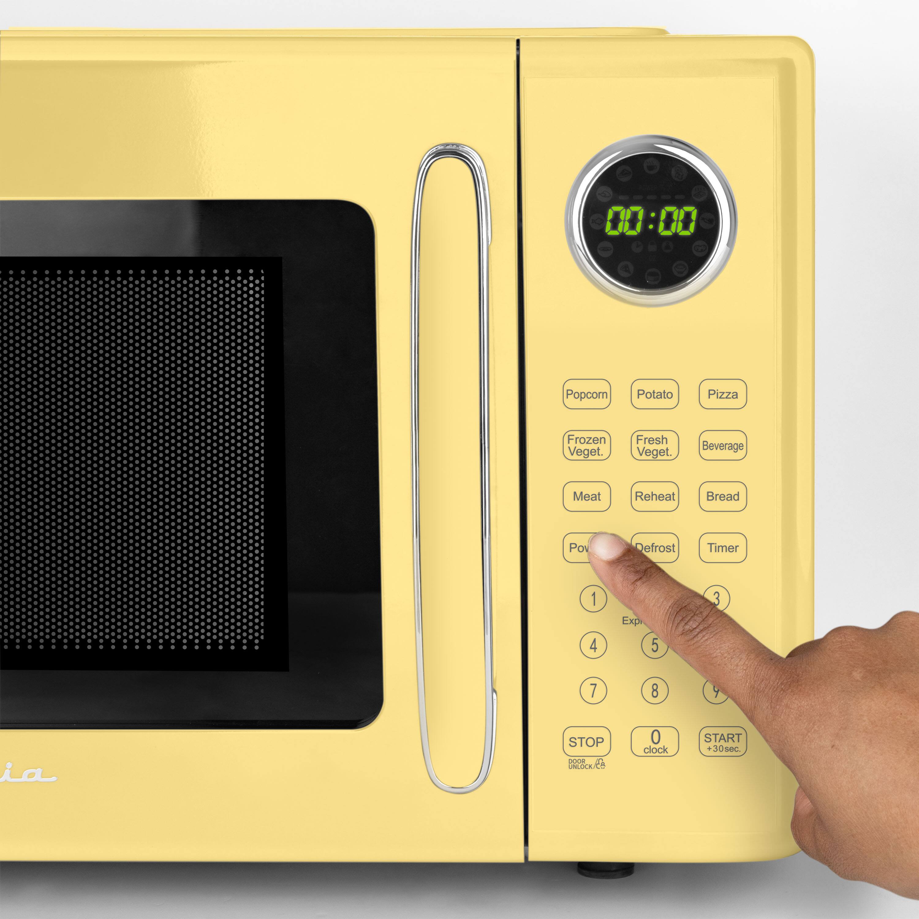 00:00 Popcorn Potato Pizza Frozen Veget Fresh Veget Beverage Meat Reheat Bread Power Defrost Timer 1 4 Expe 5 3 7 8 Y  STOP - LOOE 0 clock START 30sc