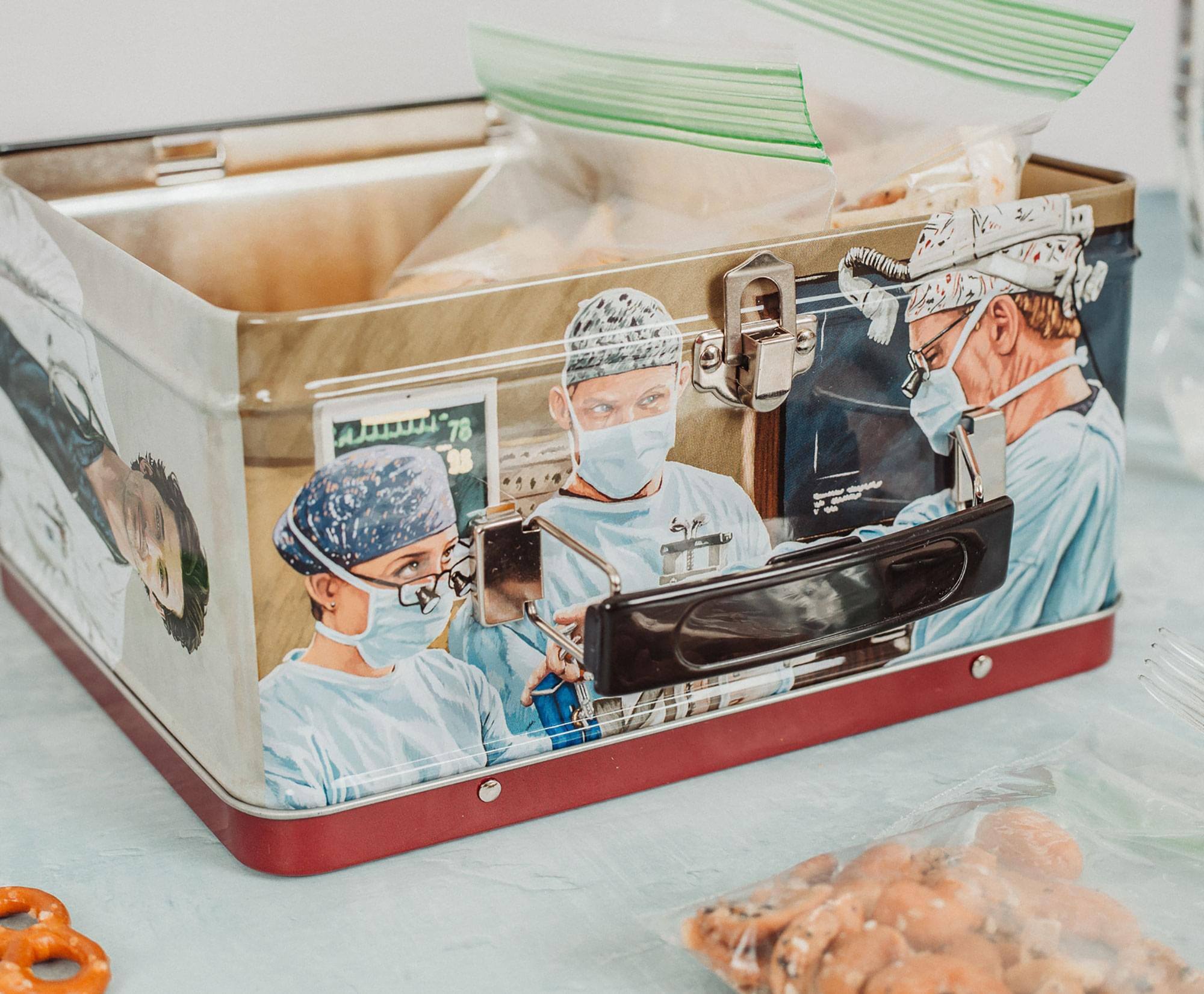 Alt View 4. Toynk - Grey's Anatomy Cast Metal Tin Lunch Box Tote | 8 x 7 x 4 Inches - Red.