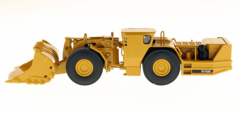 Left. Diecast Masters - CAT Caterpillar R1700G Underground Mining Loader with Operator "Core Classics" Series 1/50 Diecast - Yellow and Black.